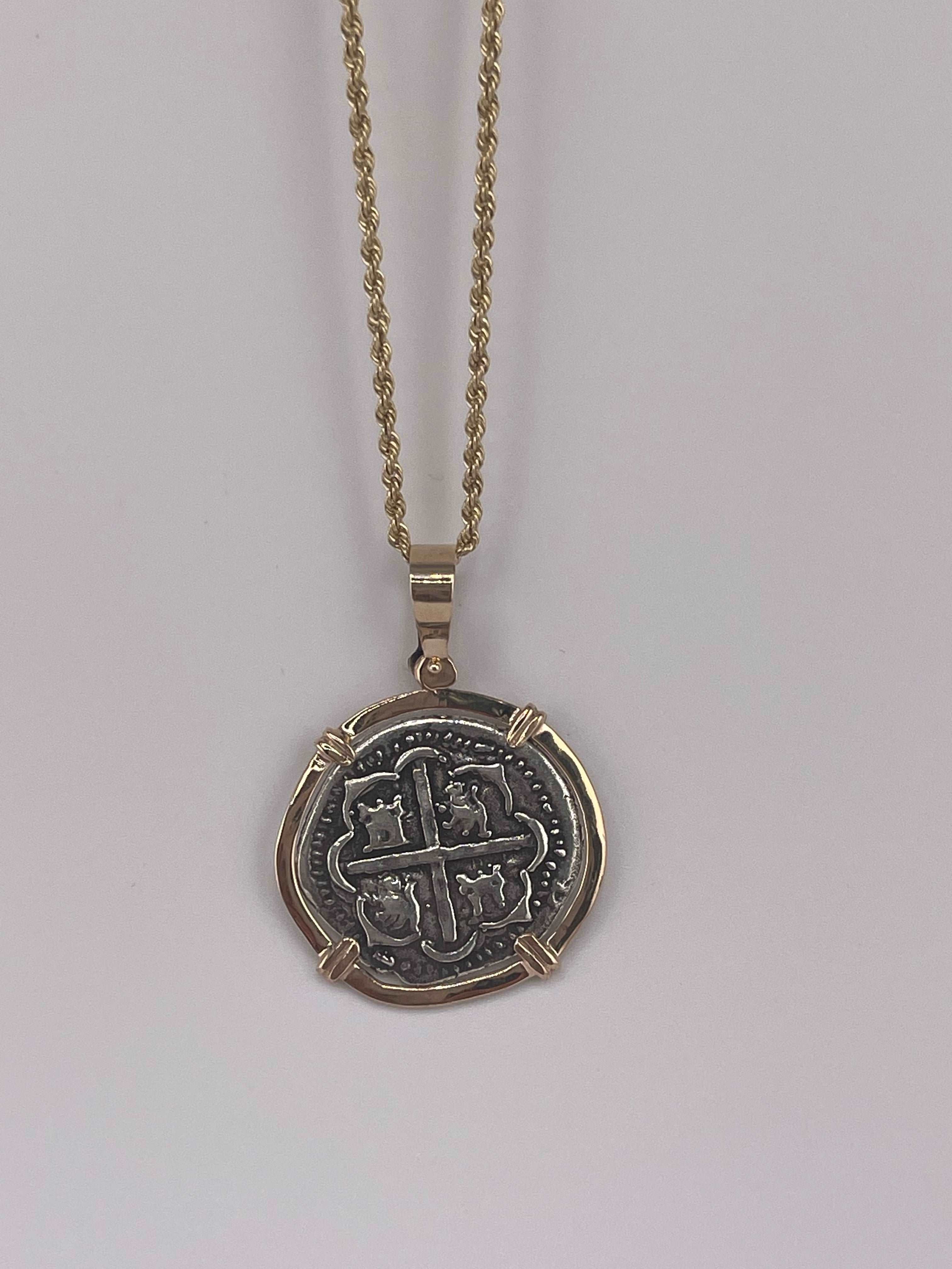 NUESTRA SENORA DE ATOCHA SILVER COIN PENDANT IN 14KT SOLID GOLD BEZEL