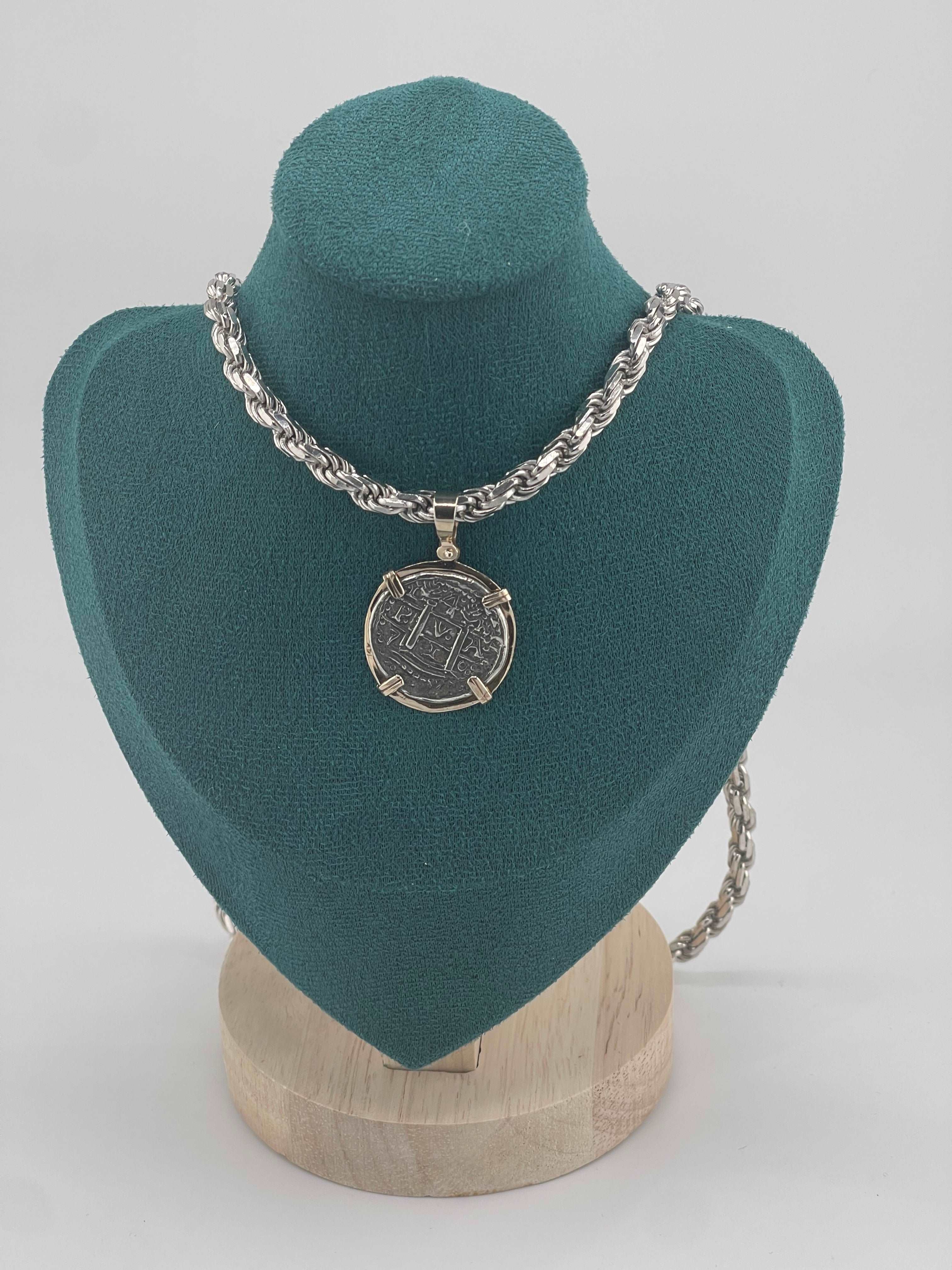 NUESTRA SENORA DE ATOCHA SILVER COIN PENDANT IN 14KT GOLD BEZEL