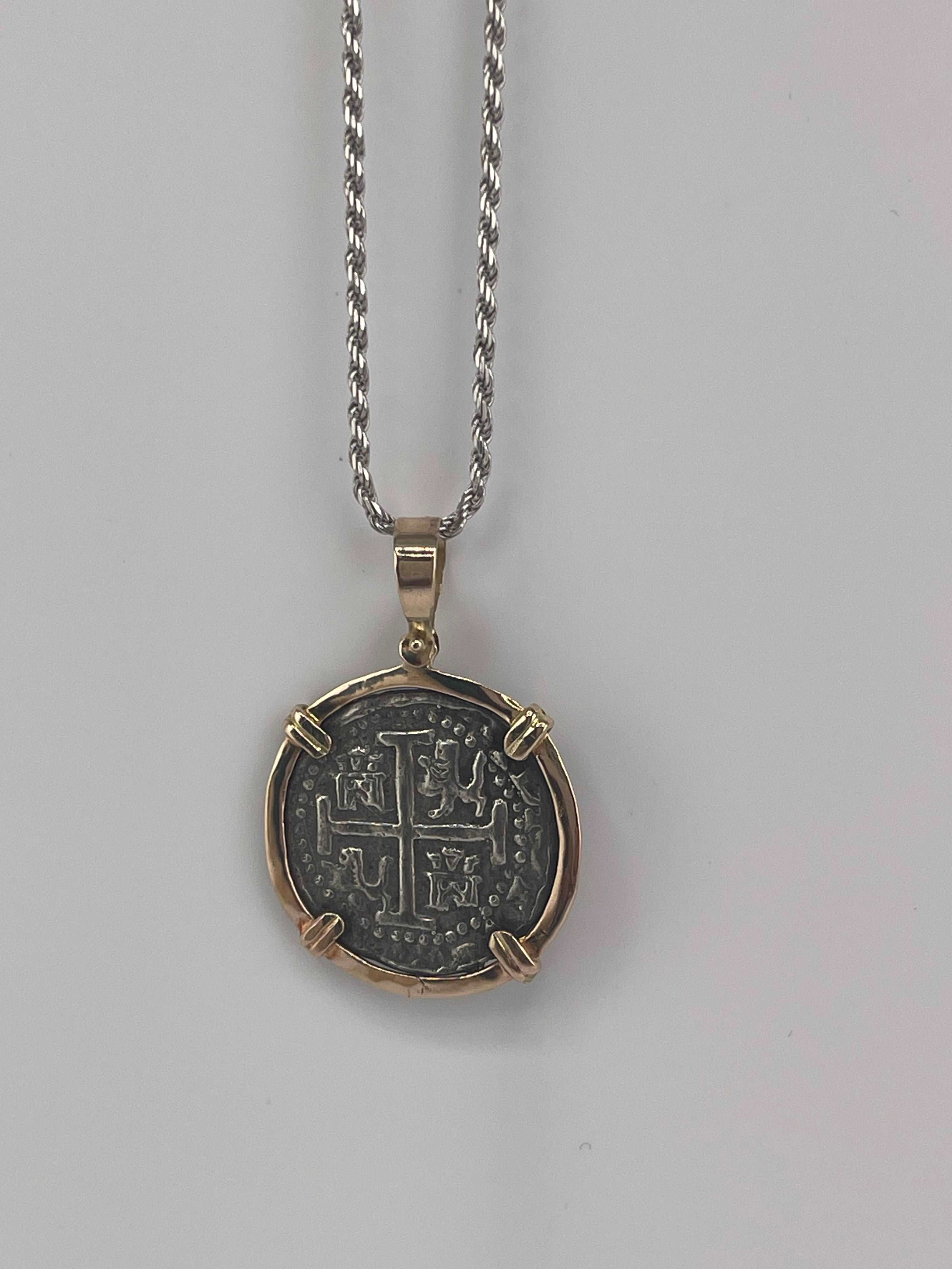 NUESTRA SENORA DE ATOCHA SILVER COIN PENDANT IN 14KT SOLID GOLD BEZEL