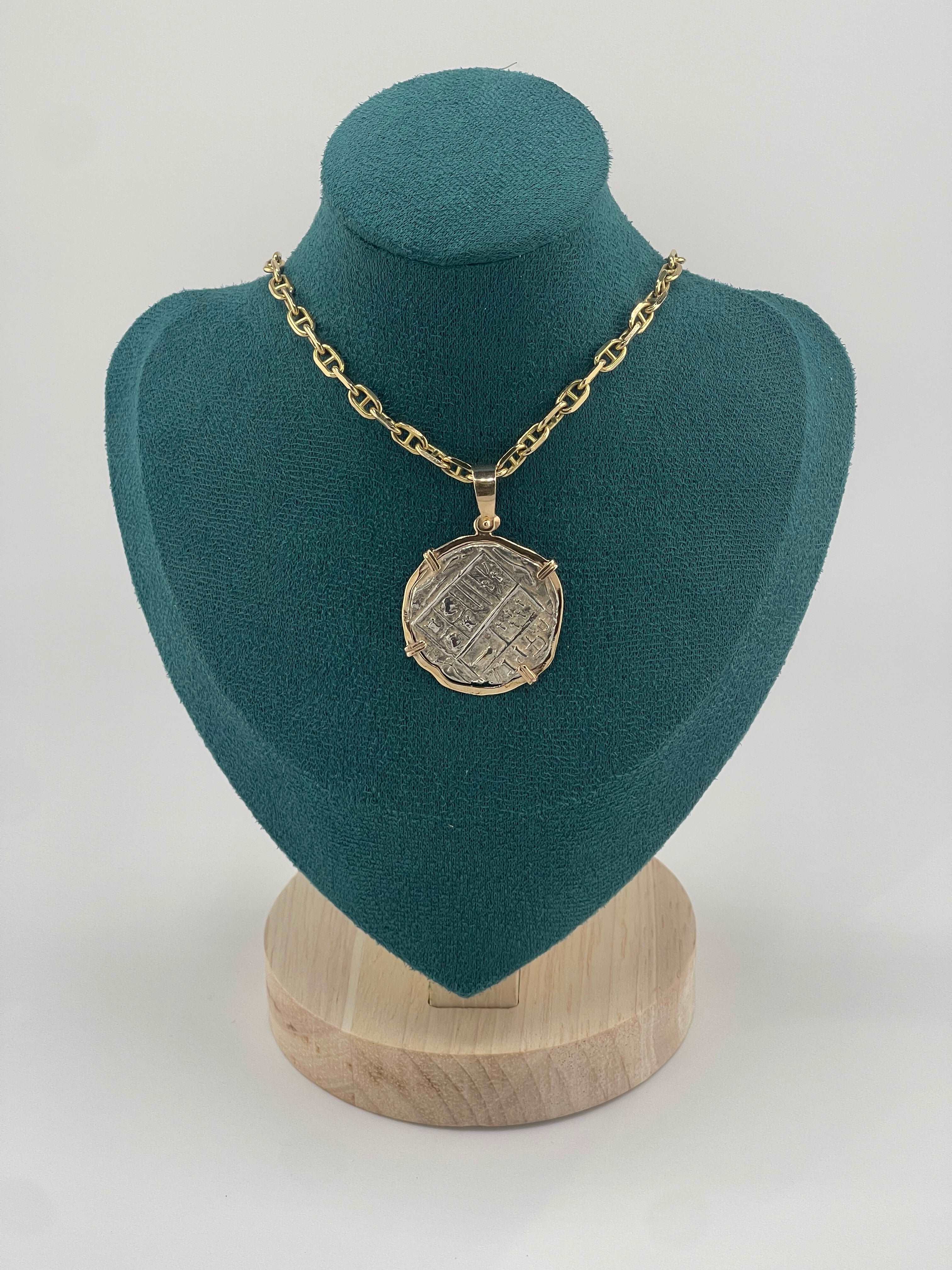 NUESTRA SENORA DE ATOCHA SOLID SILVER COIN PENDANT IN 14KT SOLID GOLD BEZEL