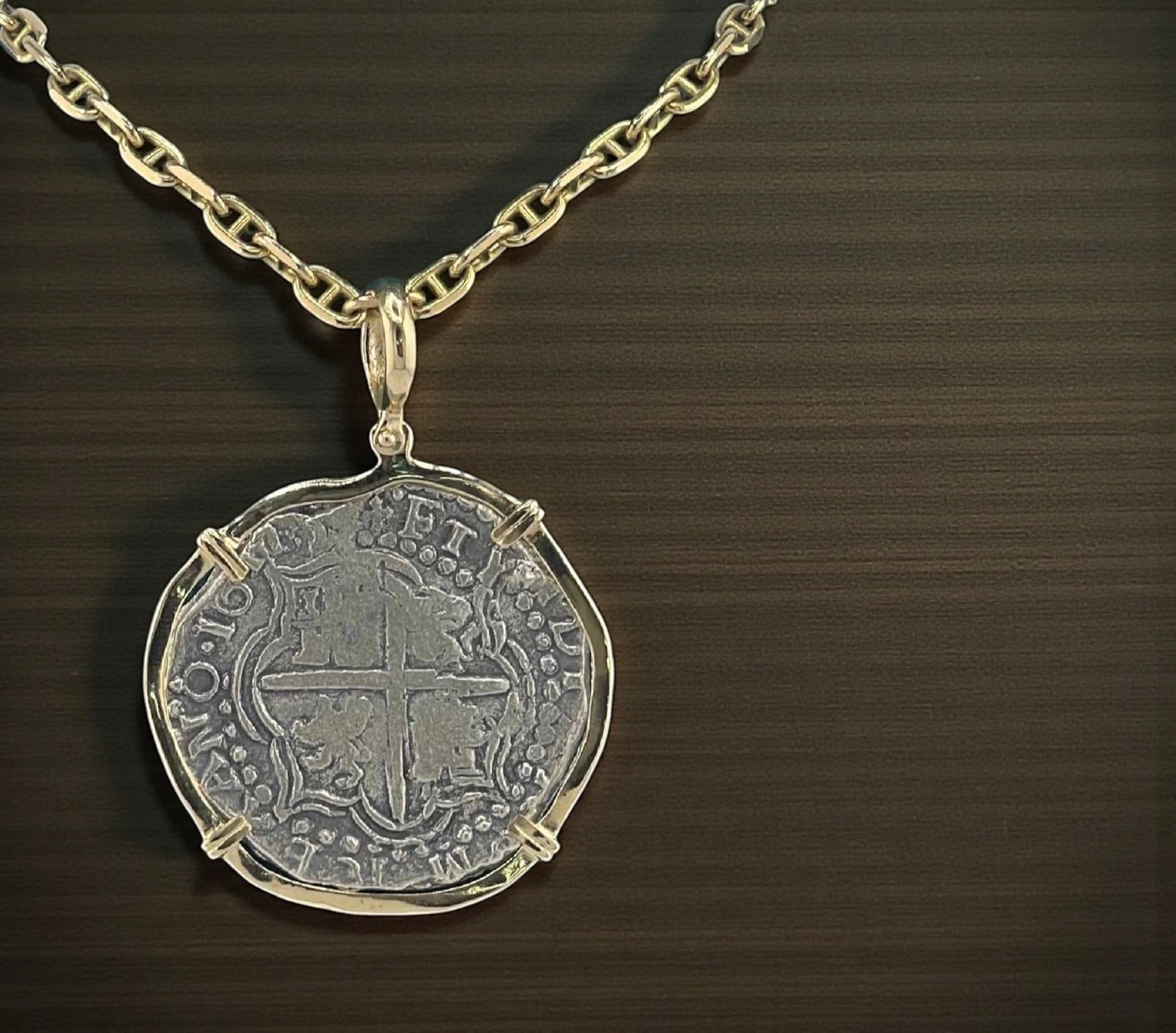 NUESTRA SENORA DE ATOCHA SOLID LARGE SIZE SILVER COIN PENDANT IN 14KT SOLID GOLD BEZEL