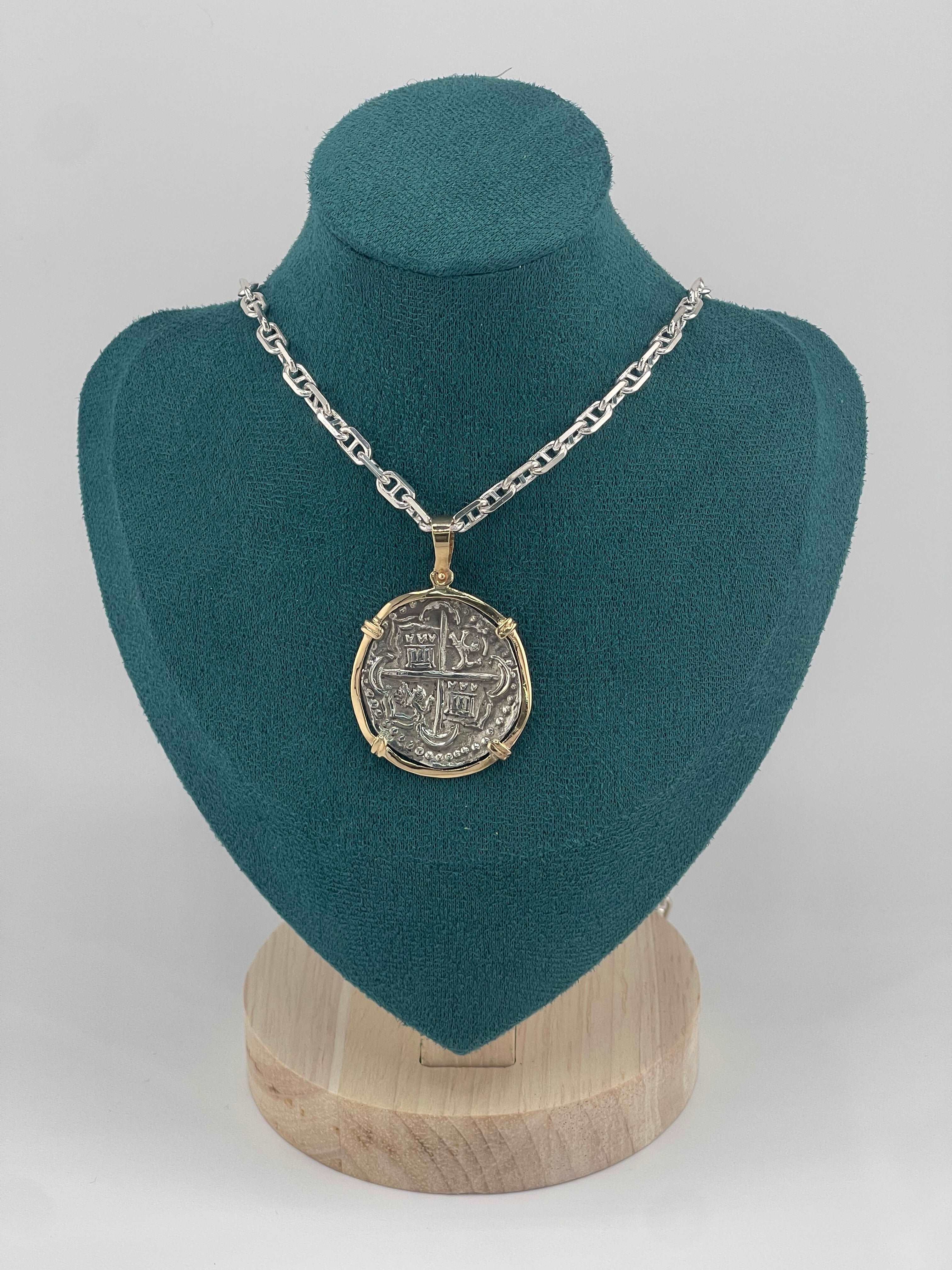 NUESTRA SENORA DE ATOCHA SOLID SILVER COIN PENDANT IN 14KT SOLID GOLD BEZEL
