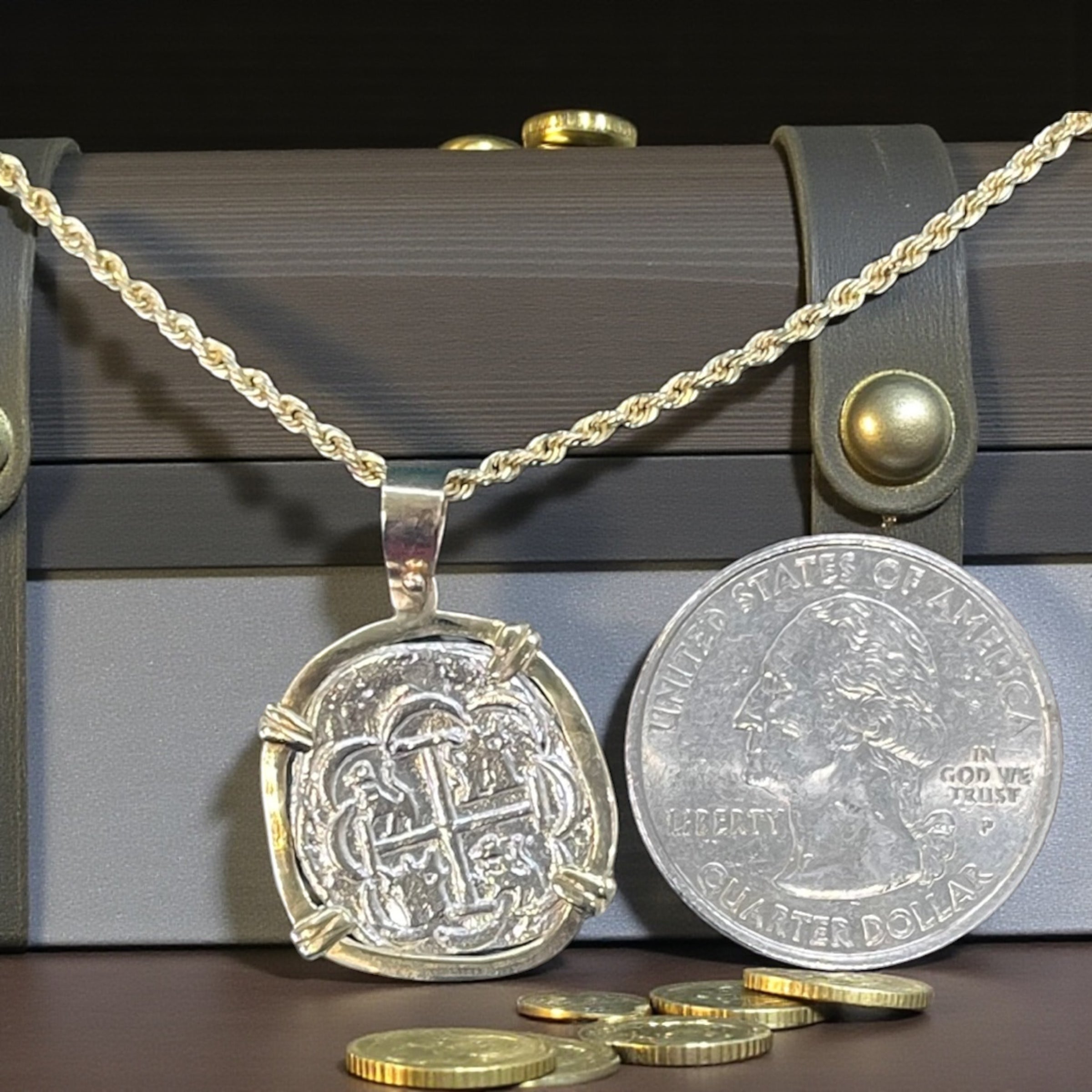 NUESTRA SENORA DE ATOCHA SILVER COIN PENDANT IN 14KT GOLD BEZEL