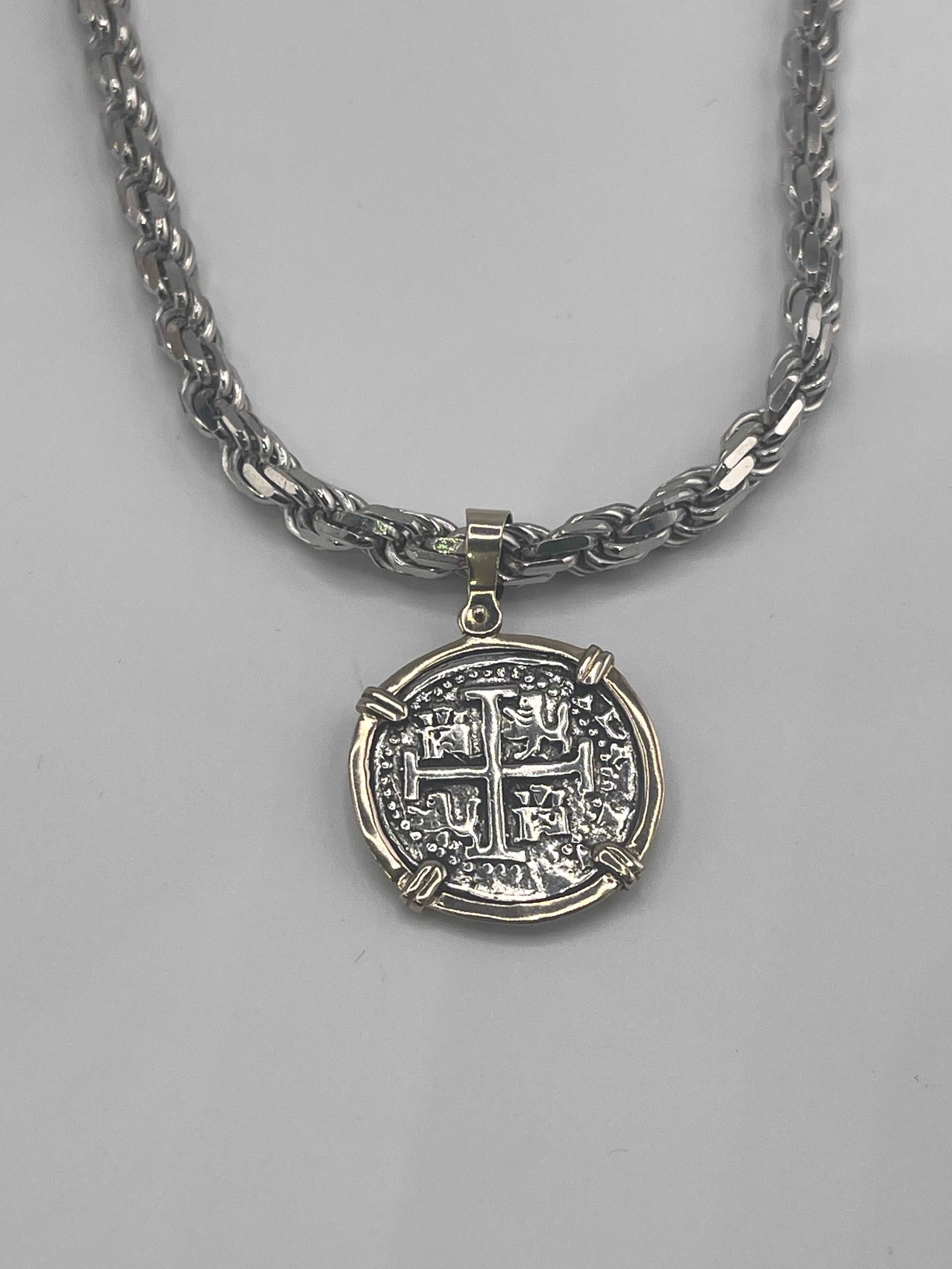 NUESTRA SENORA DE ATOCHA SILVER COIN PENDANT IN 14KT GOLD BEZEL