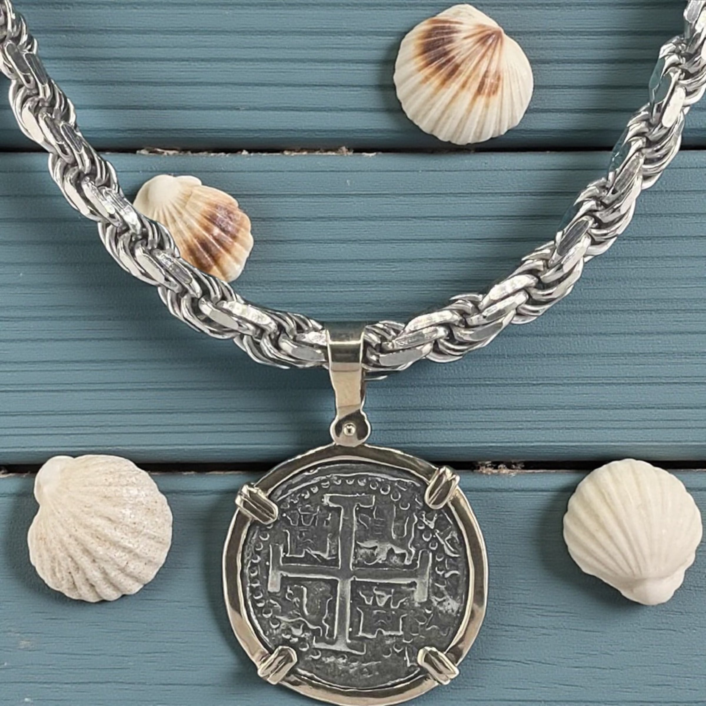 NUESTRA SENORA DE ATOCHA SILVER COIN PENDANT IN 14KT GOLD BEZEL