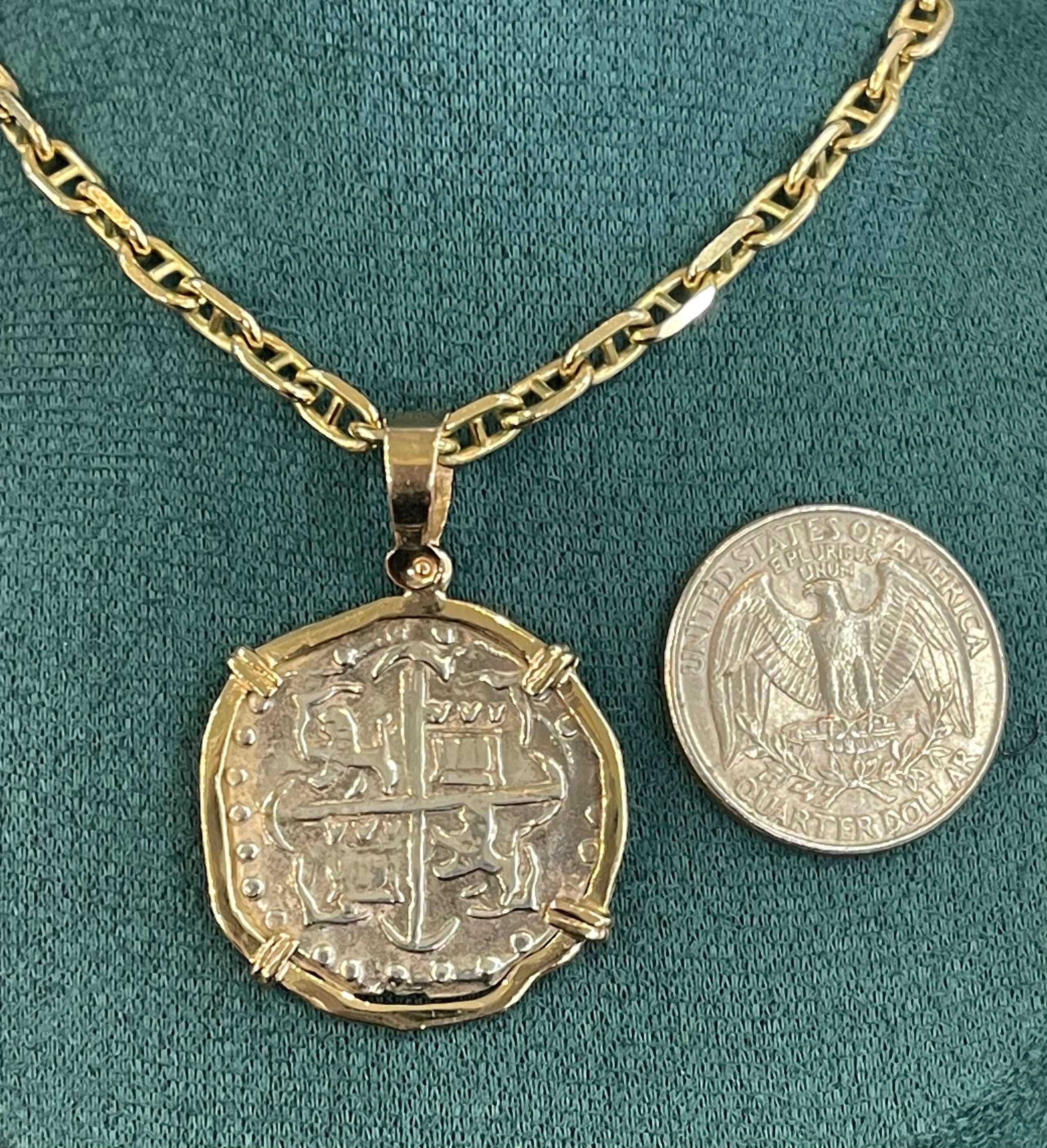 NUESTRA SENORA DE ATOCHA SOLID SILVER COIN PENDANT IN 14KT SOLID GOLD BEZEL