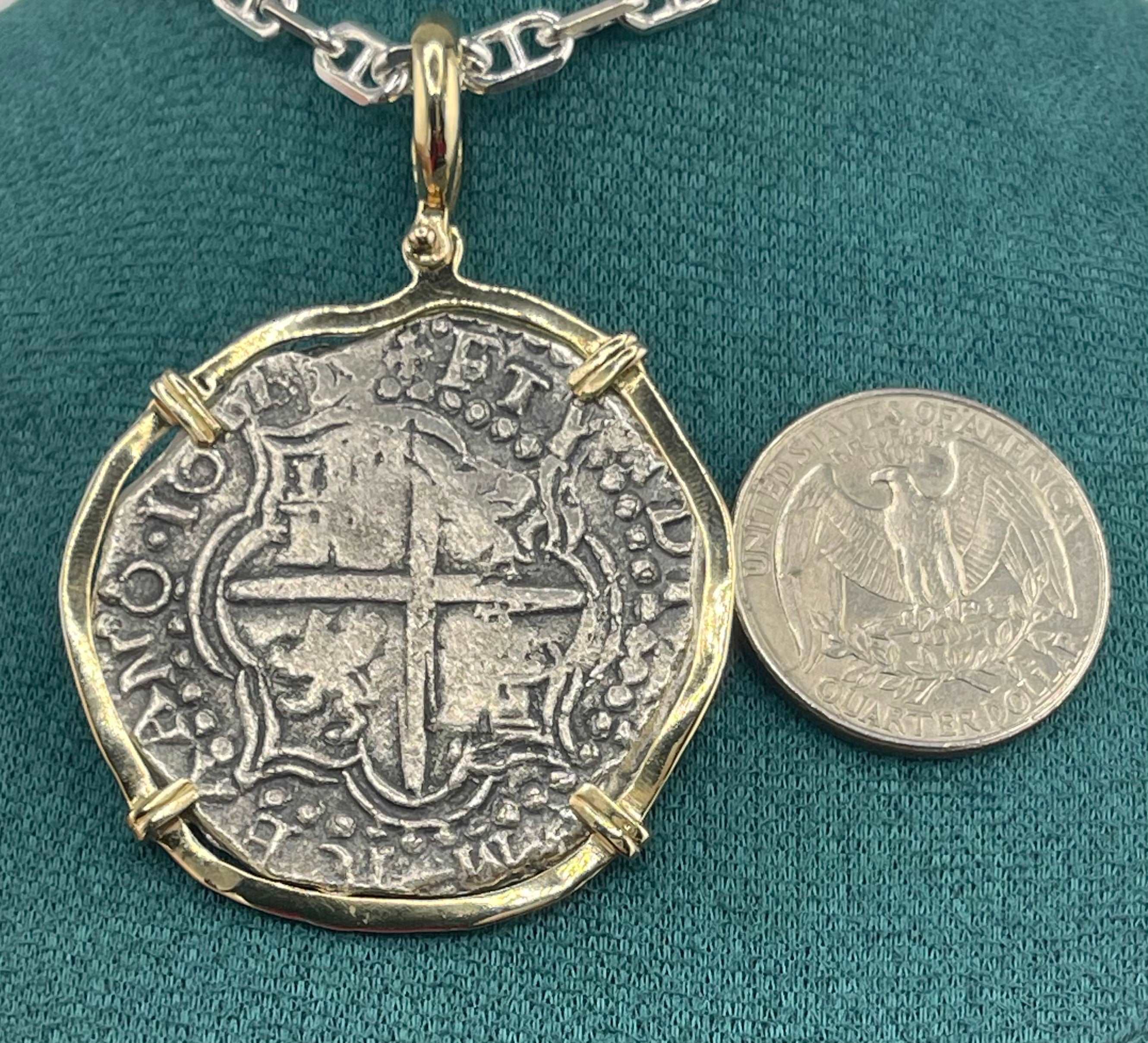 NUESTRA SENORA DE ATOCHA SOLID LARGE SIZE SILVER COIN PENDANT IN 14KT SOLID GOLD BEZEL