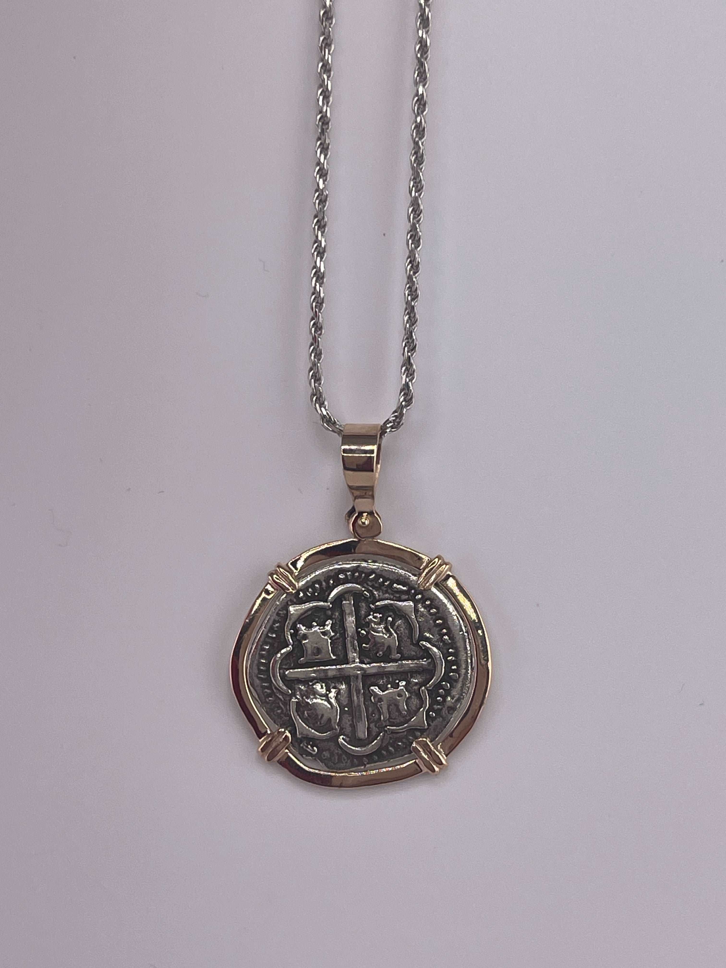 NUESTRA SENORA DE ATOCHA SILVER COIN PENDANT IN 14KT SOLID GOLD BEZEL