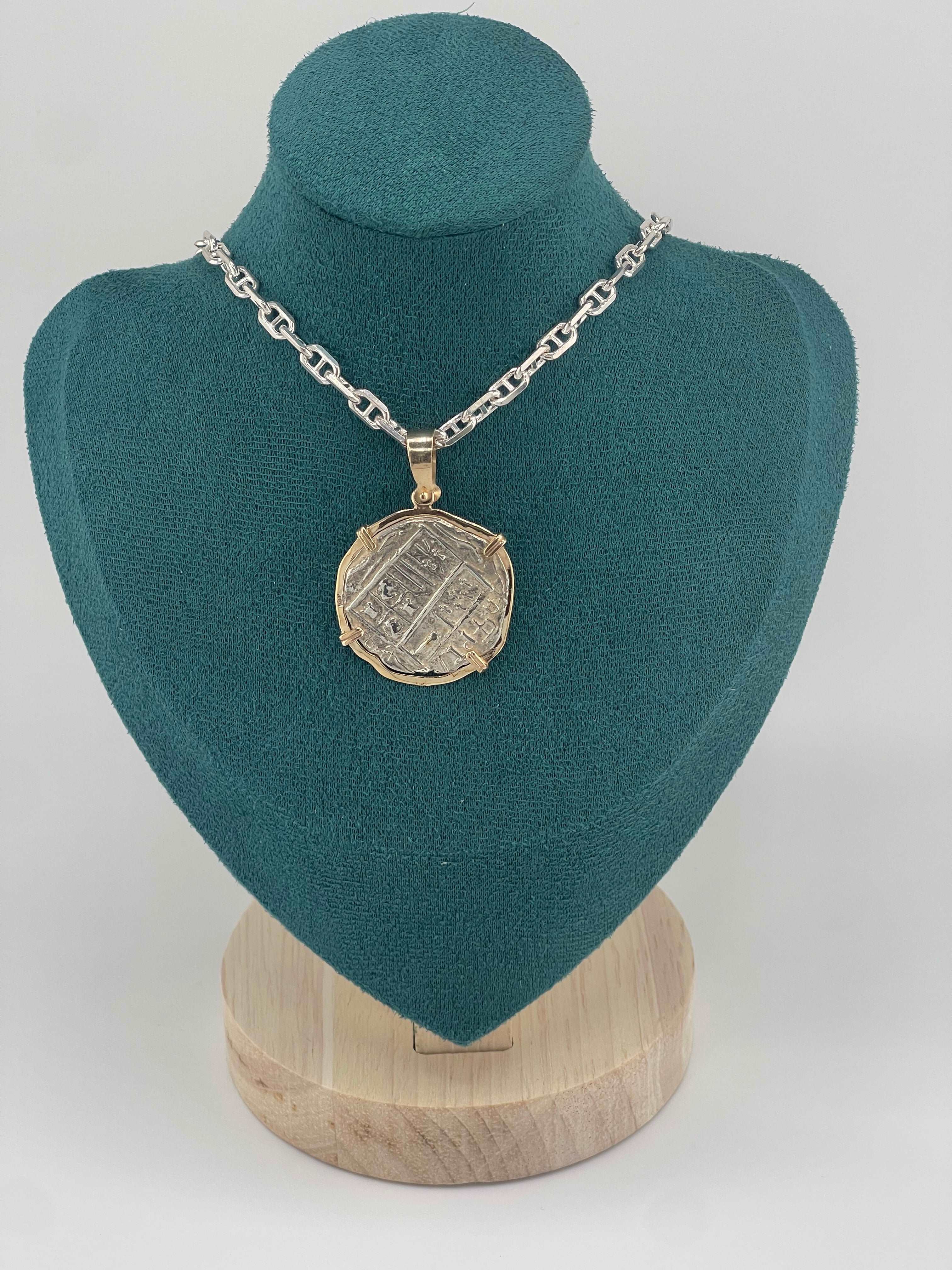 NUESTRA SENORA DE ATOCHA SOLID SILVER COIN PENDANT IN 14KT SOLID GOLD BEZEL