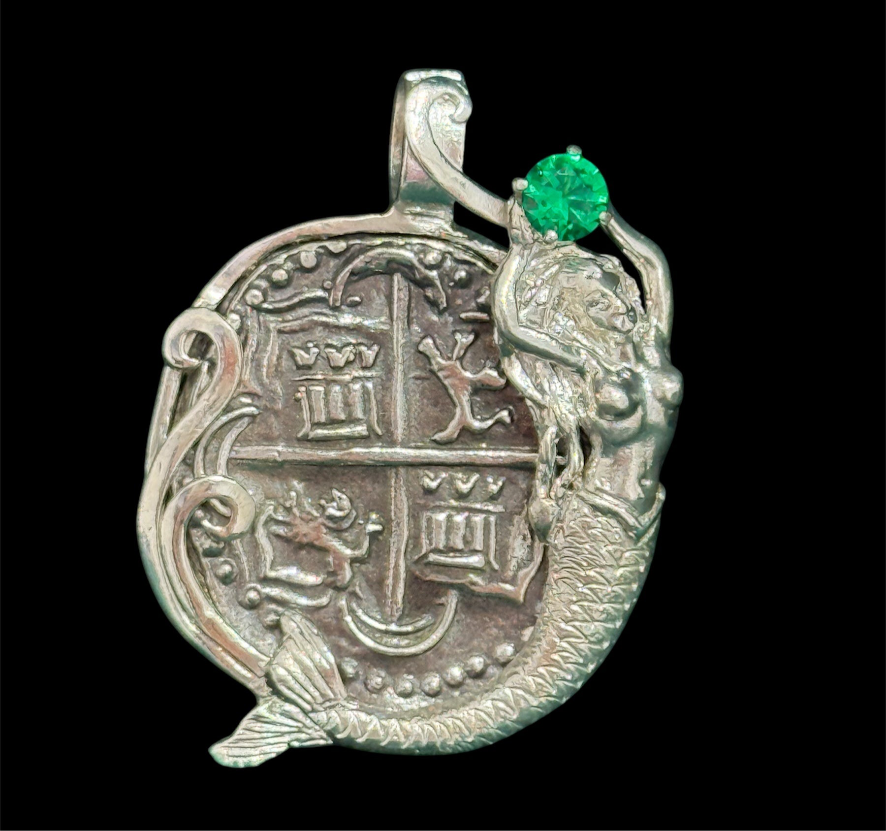 Atocha shipwreck silver coin pendant in mermaid bezel holding emerald