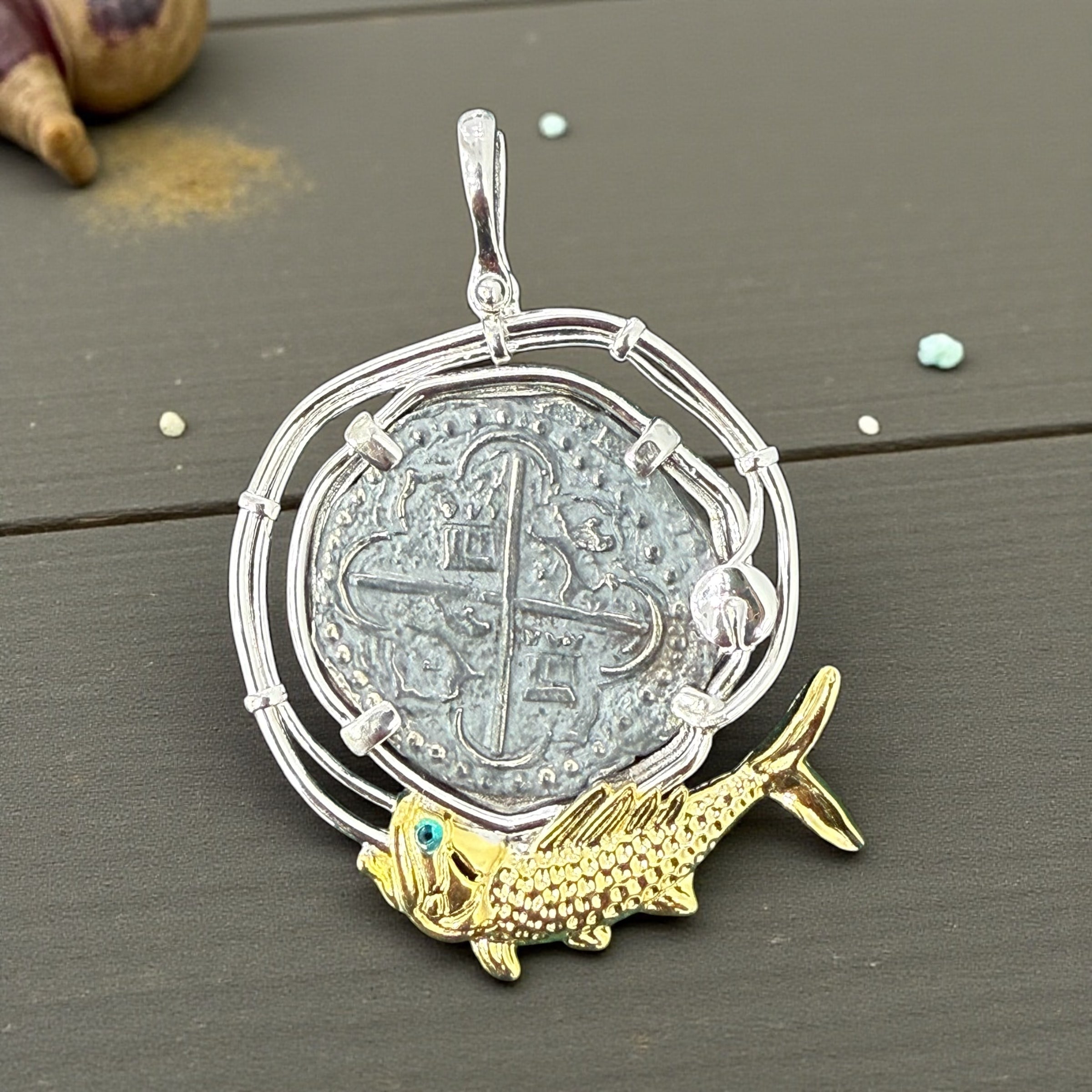 Atocha large size silver coin pendant in beautiful hook rope bezel and 14k gold vermeil fish setting on bottom in green crystal eye