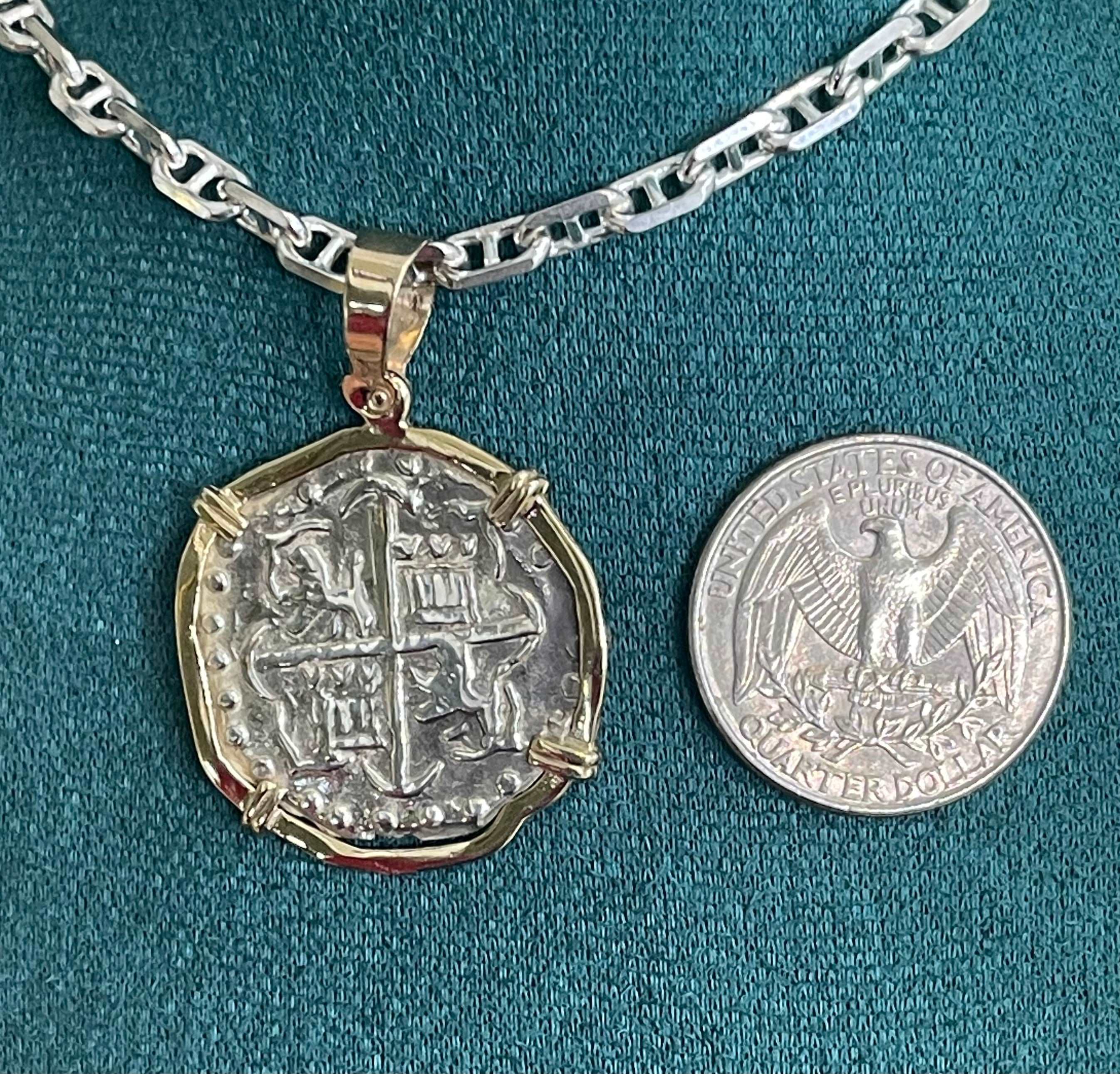 NUESTRA SENORA DE ATOCHA SOLID SILVER COIN PENDANT IN 14KT SOLID GOLD BEZEL