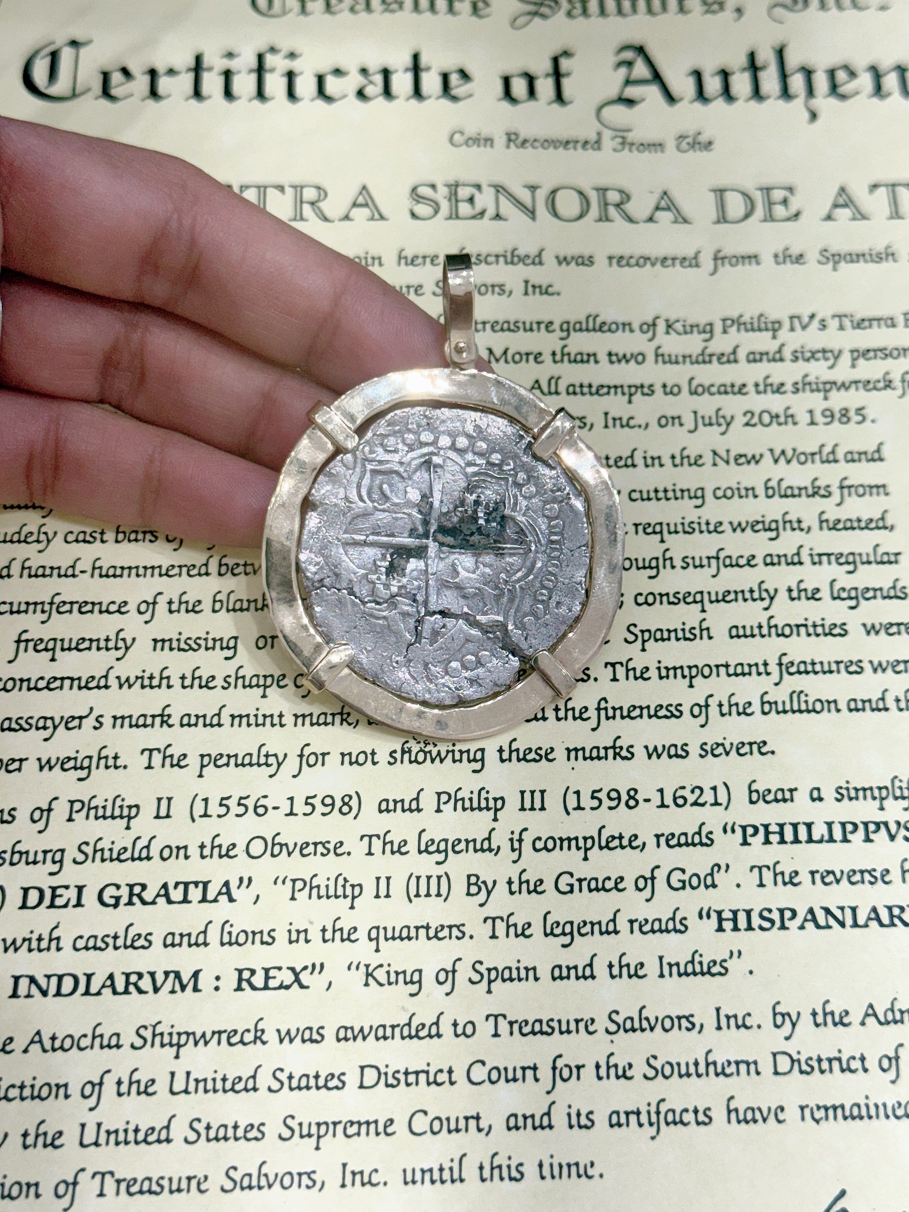 ACTUAL COIN NUESTRA SENORA DE ATOCHA SILVER COIN 8 REALE GRADE 1 COIN NO 85A-157139 DATED ##21 BEZELED WITH 14k SOLID GOLD