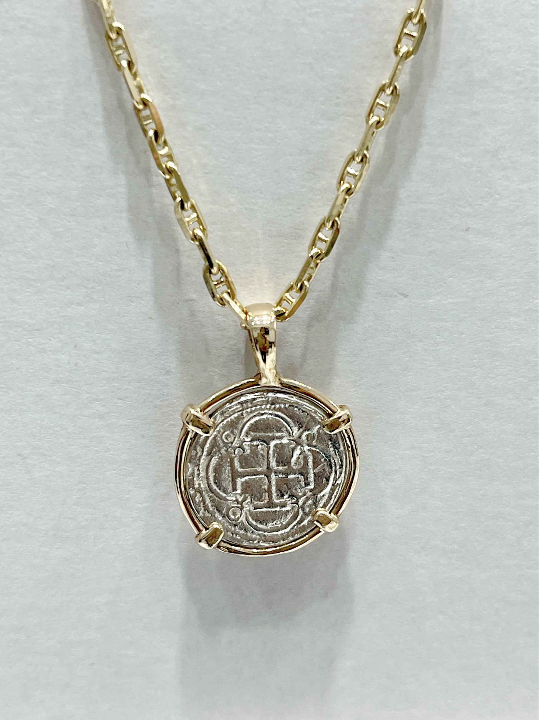 NUESTRA SENORA DE ATOCHA SILVER DIME SIZE COIN PENDANT MADE FROM ATOCHA SILVER IN 14KT SOLID GOLD BEZEL
