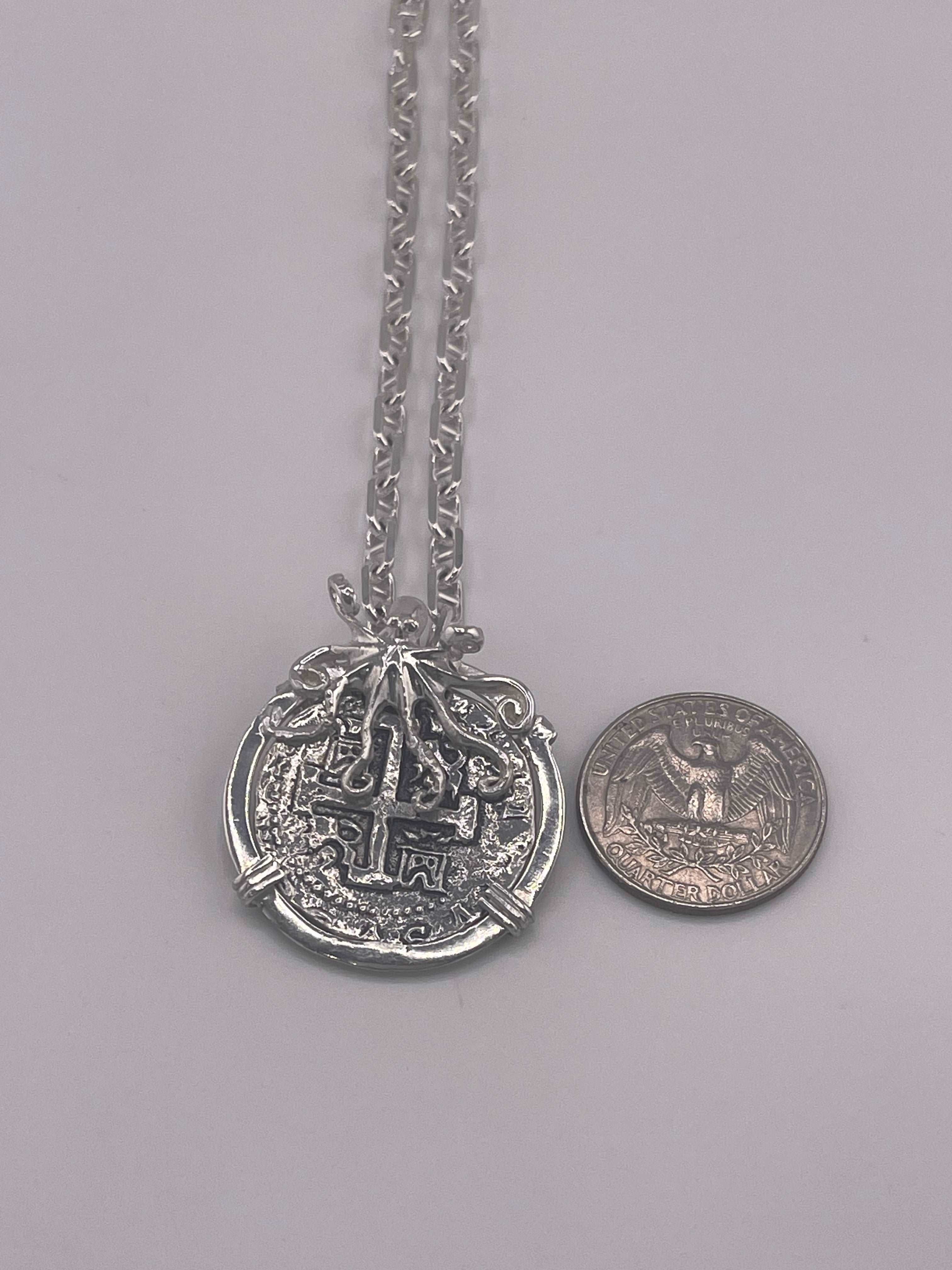 ATOCHA SOLID SILVER COIN PENDANT IN BEAUTIFUL OCTOPUS BEZEL