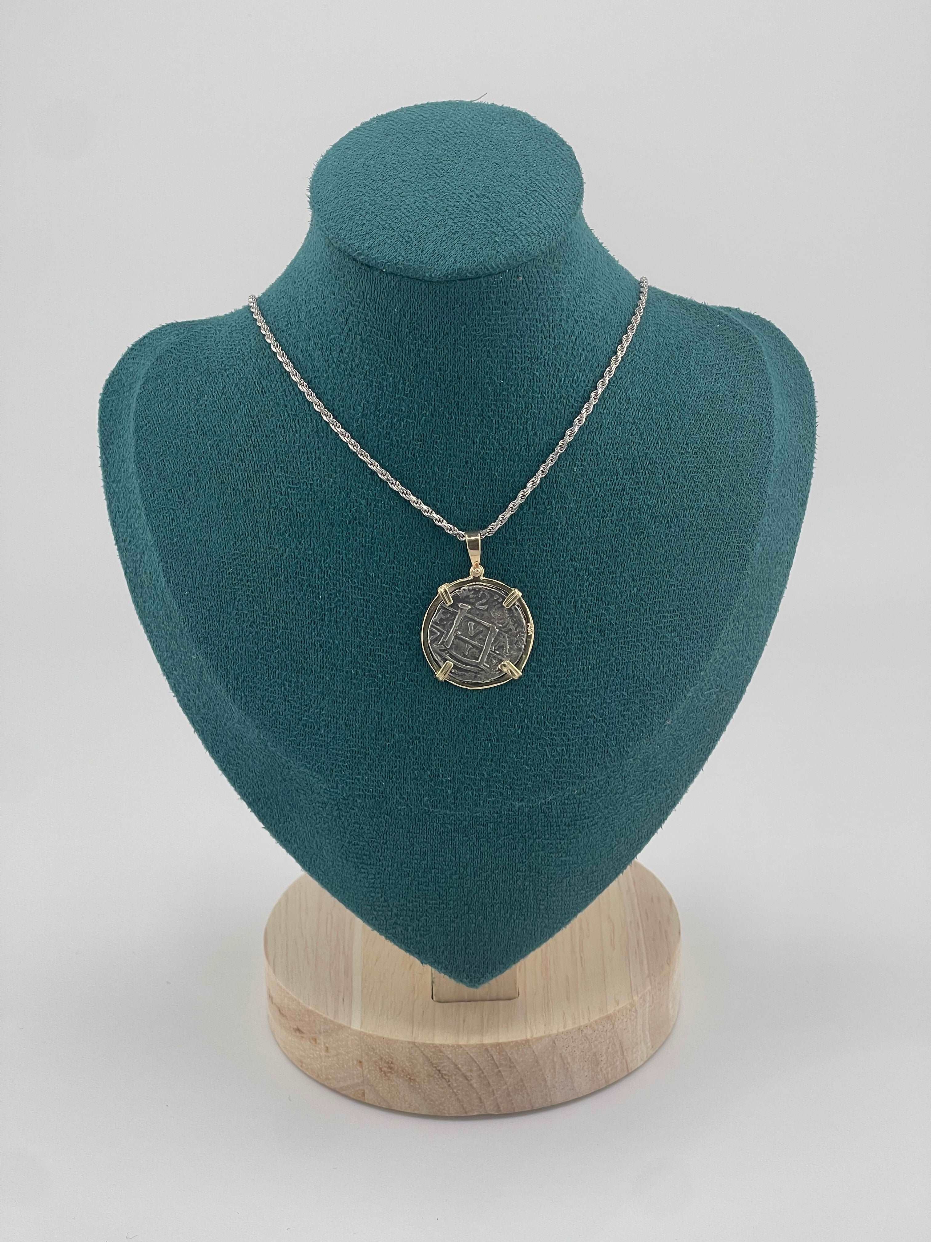NUESTRA SENORA DE ATOCHA SILVER COIN PENDANT IN 14KT GOLD BEZEL