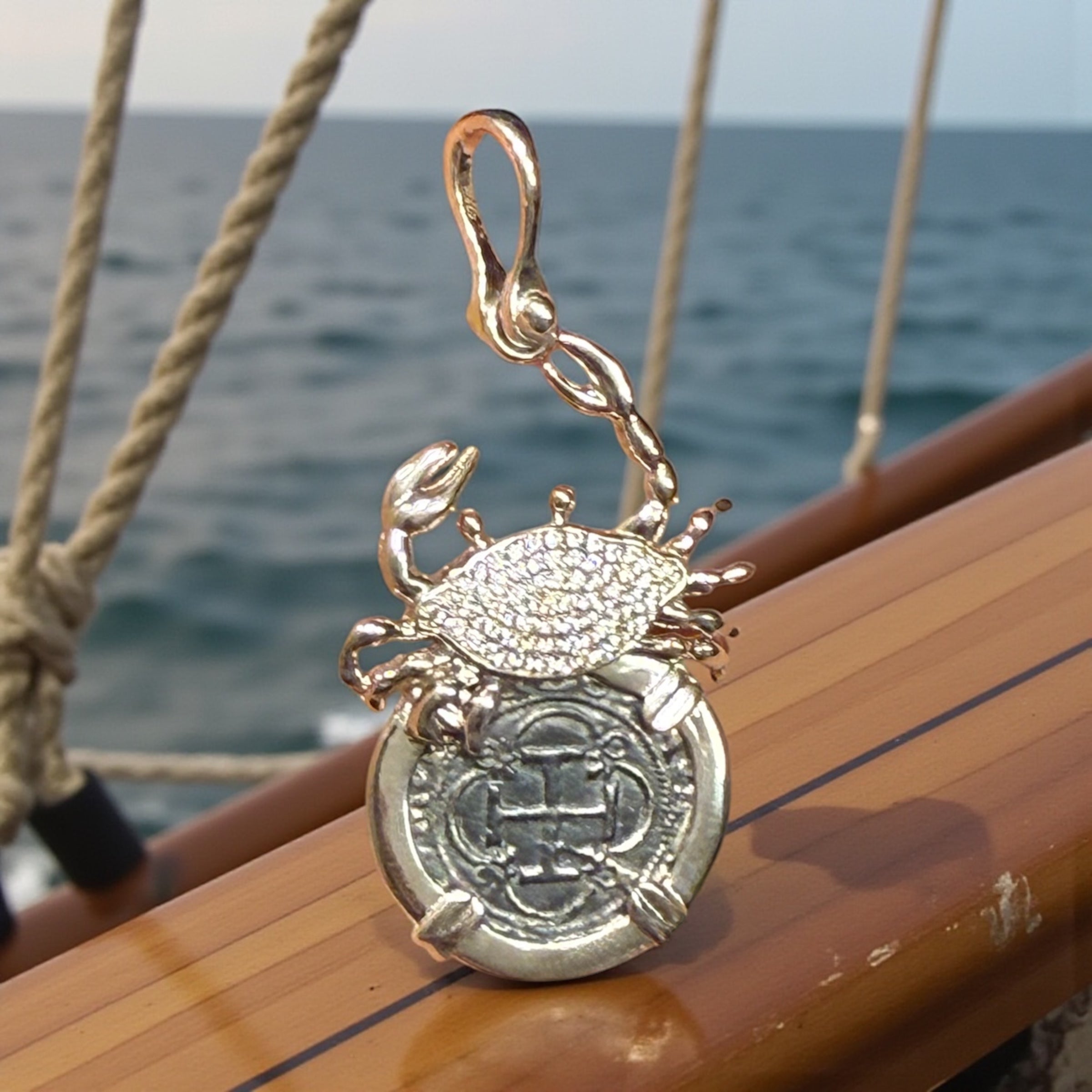 Atocha Shipwreck silver coin pendant in crystal crab setting