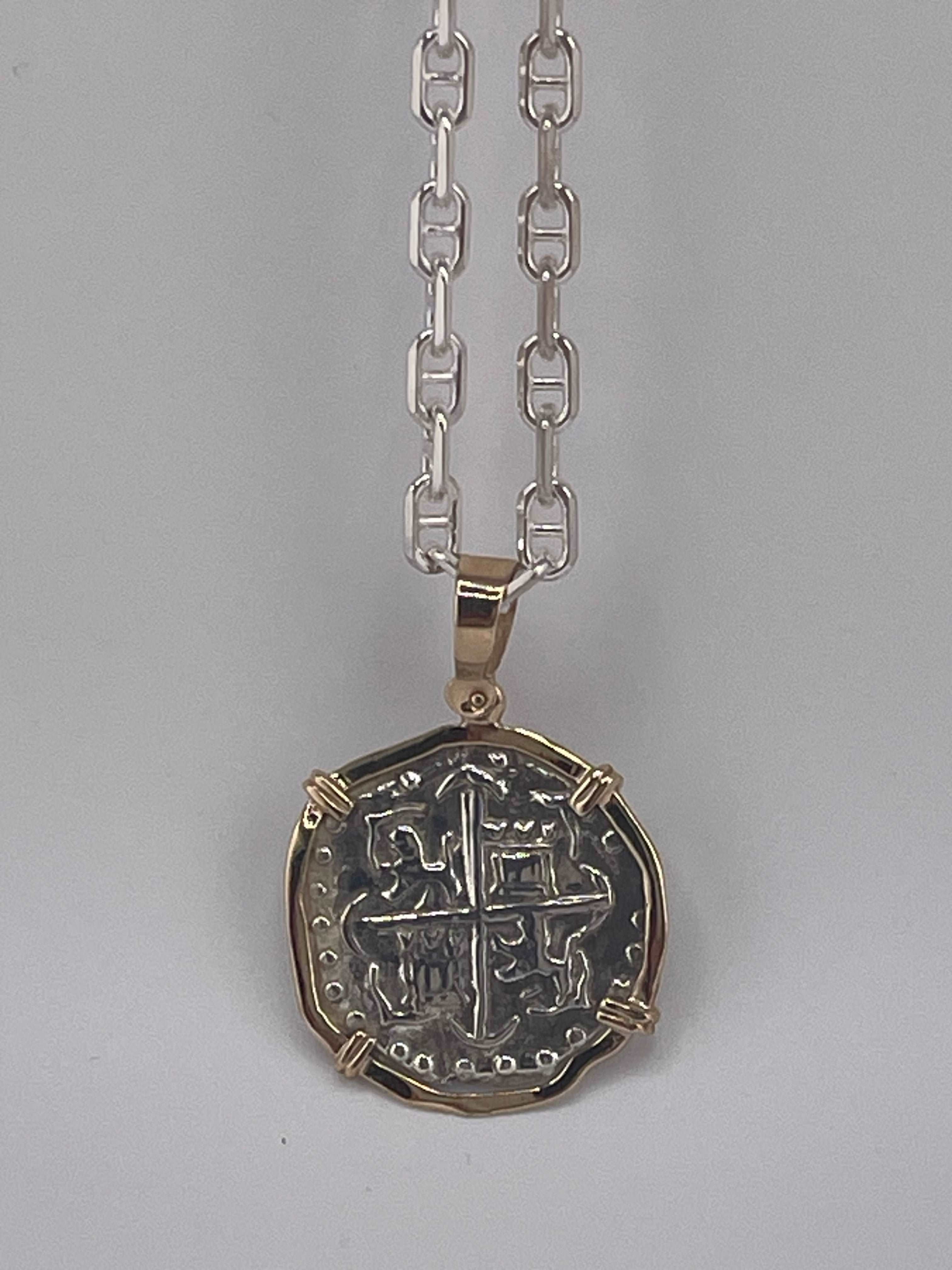 NUESTRA SENORA DE ATOCHA SOLID SILVER COIN PENDANT IN 14KT SOLID GOLD BEZEL