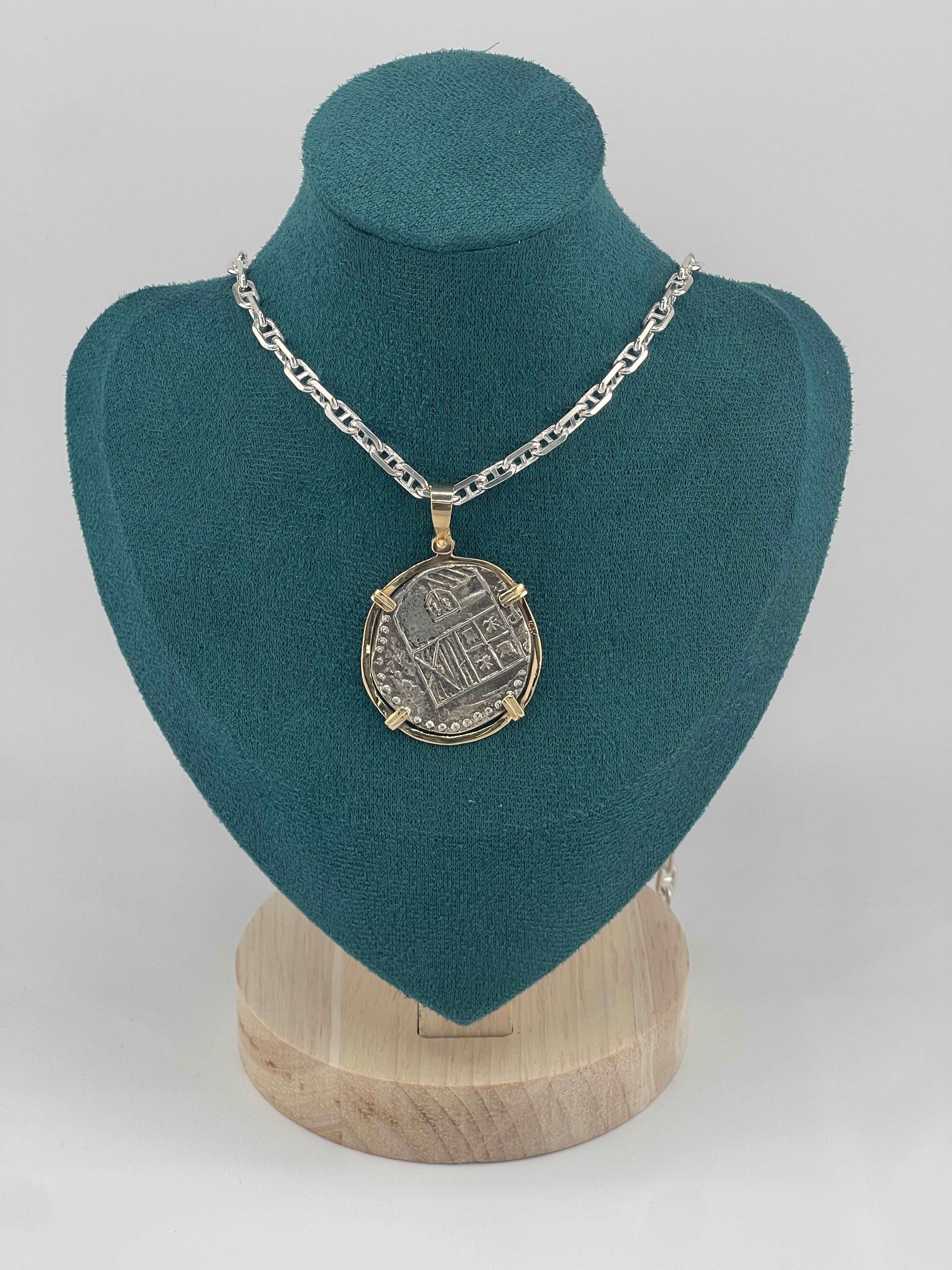 NUESTRA SENORA DE ATOCHA SOLID SILVER COIN PENDANT IN 14KT SOLID GOLD BEZEL