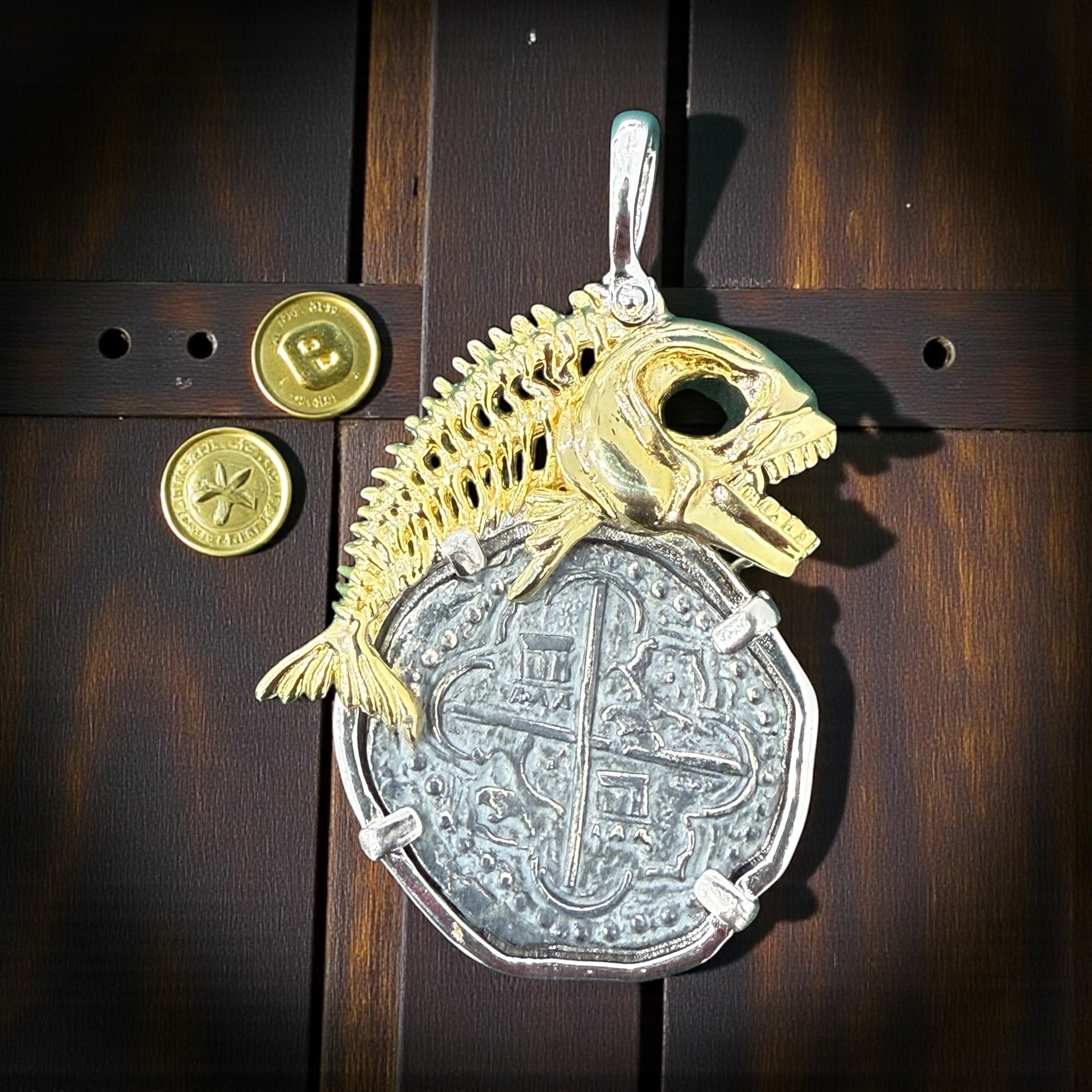 Atocha shipwreck large size silver coin pendant in beautiful hook rope bezel and 14k gold vermeil fish setting on top