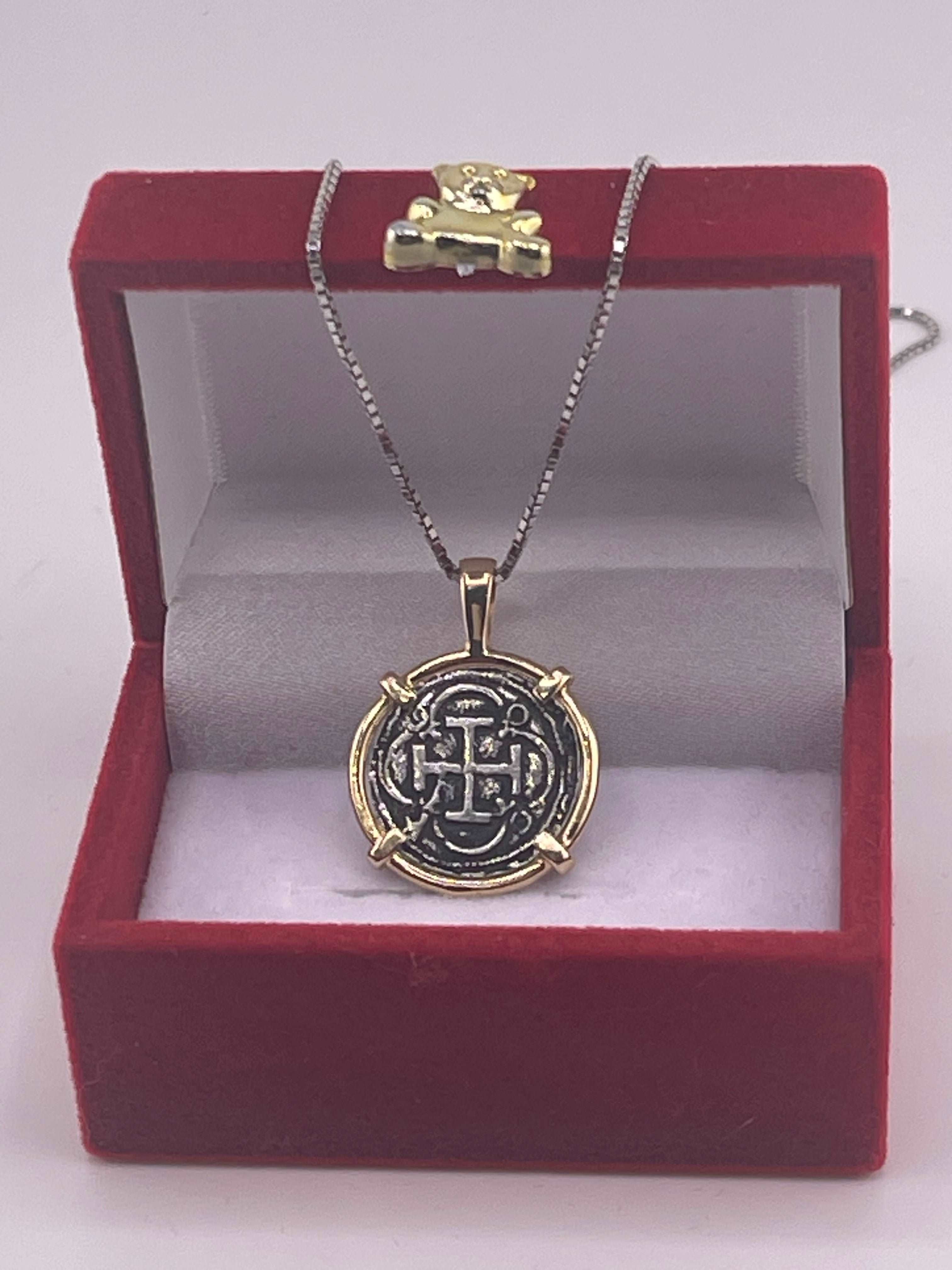 NUESTRA SENORA DE ATOCHA SILVER COIN PENDANT IN 14KT GOLD BEZEL