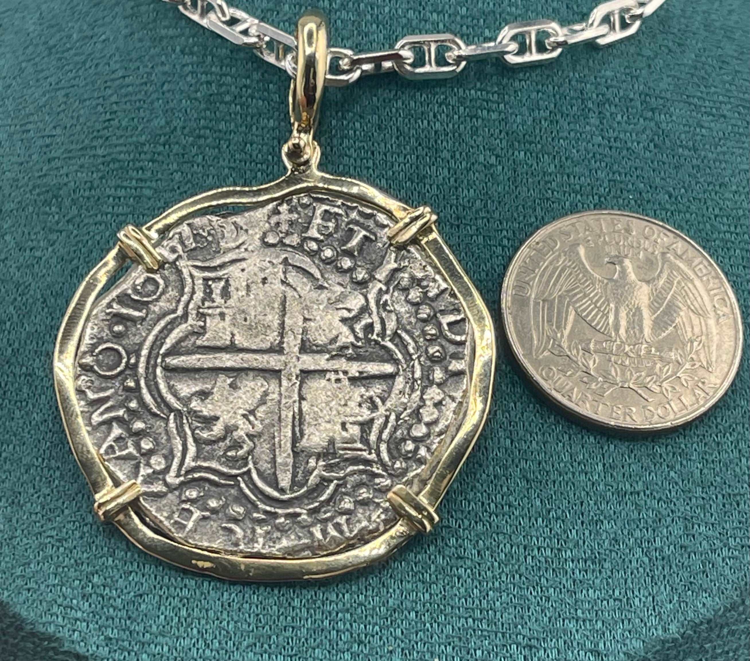 NUESTRA SENORA DE ATOCHA SOLID LARGE SIZE SILVER COIN PENDANT IN 14KT SOLID GOLD BEZEL