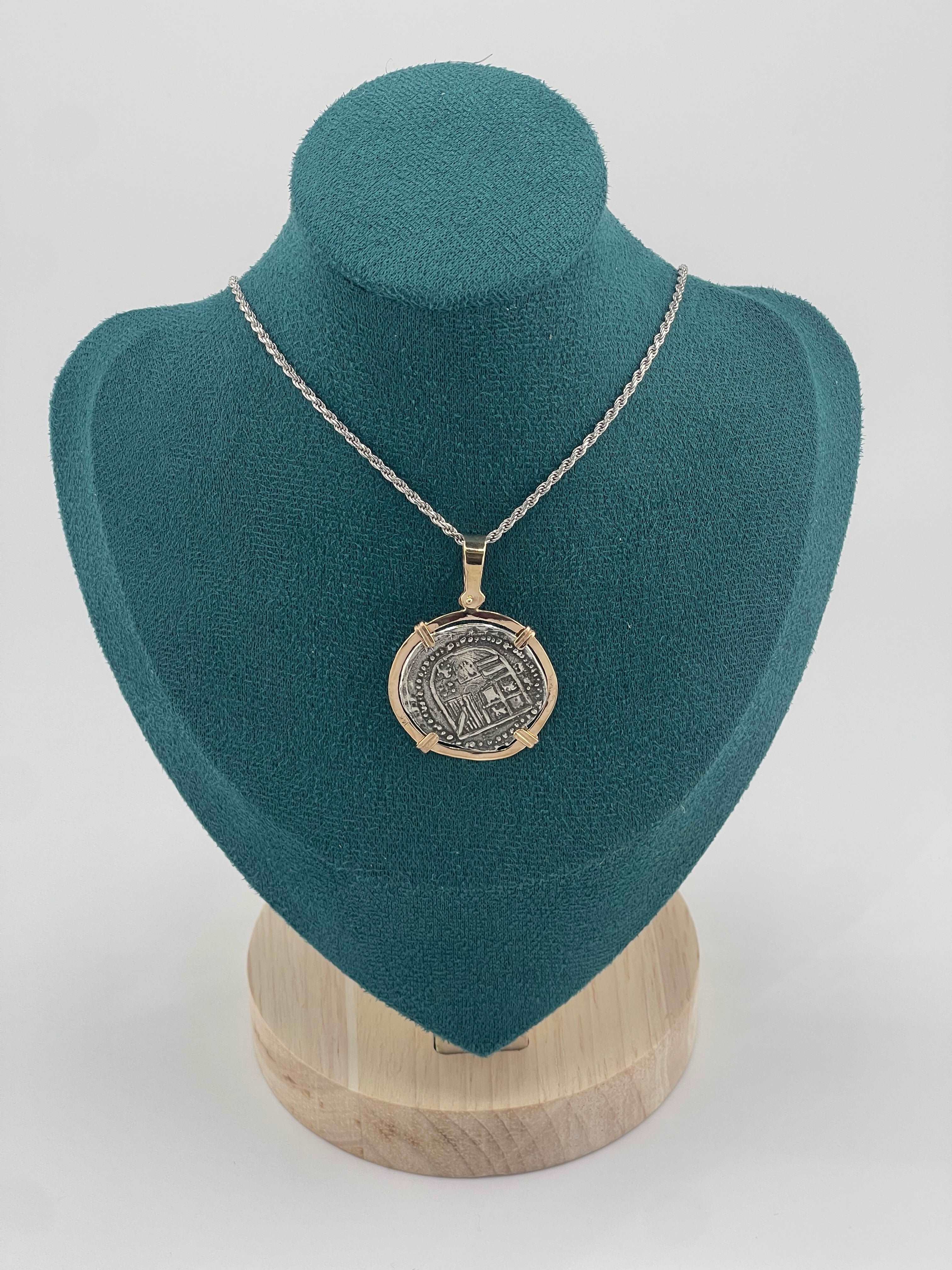 NUESTRA SENORA DE ATOCHA SILVER COIN PENDANT IN 14KT SOLID GOLD BEZEL
