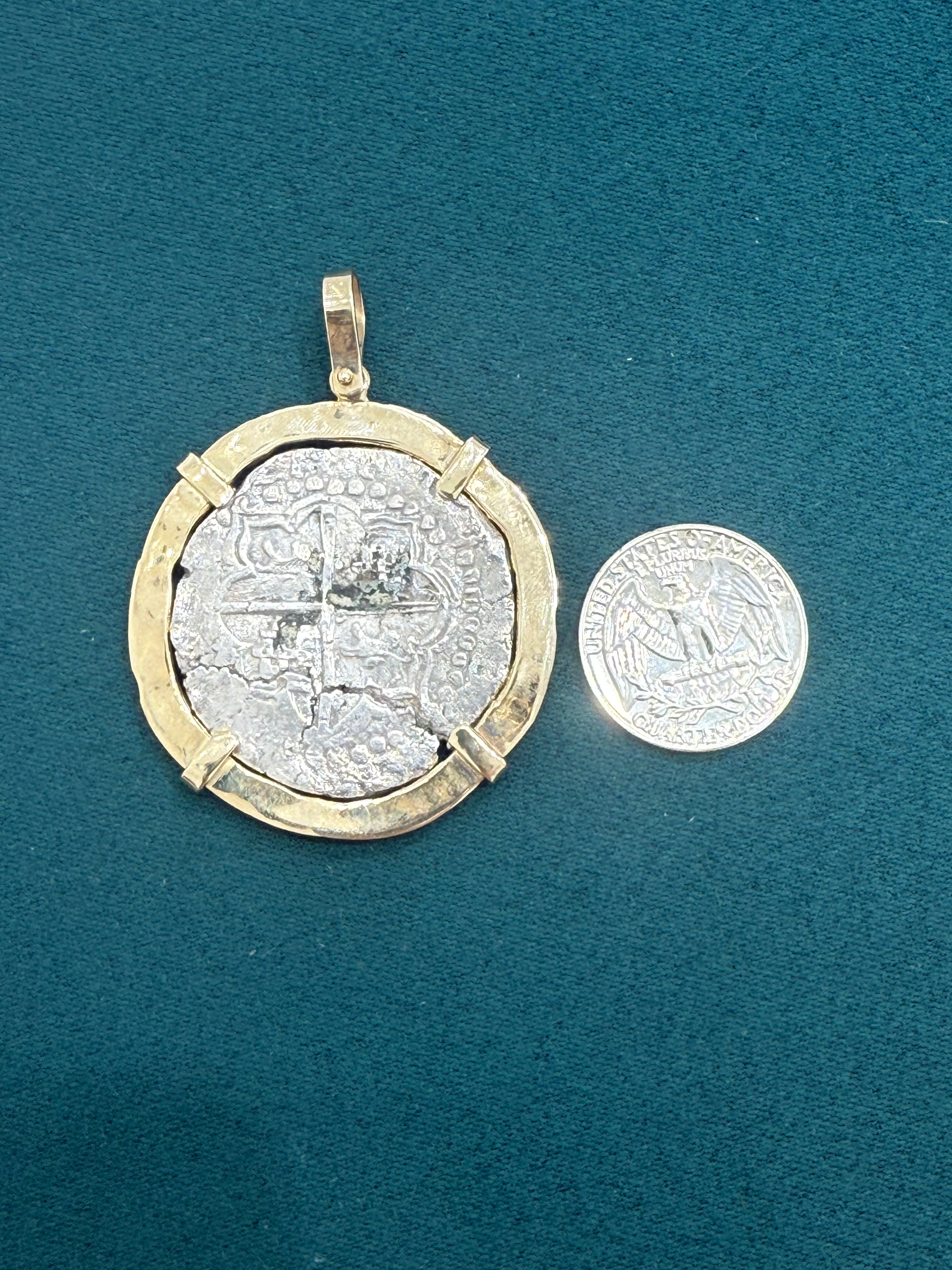 ACTUAL COIN NUESTRA SENORA DE ATOCHA SILVER COIN 8 REALE GRADE 1 COIN NO 85A-157139 DATED ##21 BEZELED WITH 14k SOLID GOLD