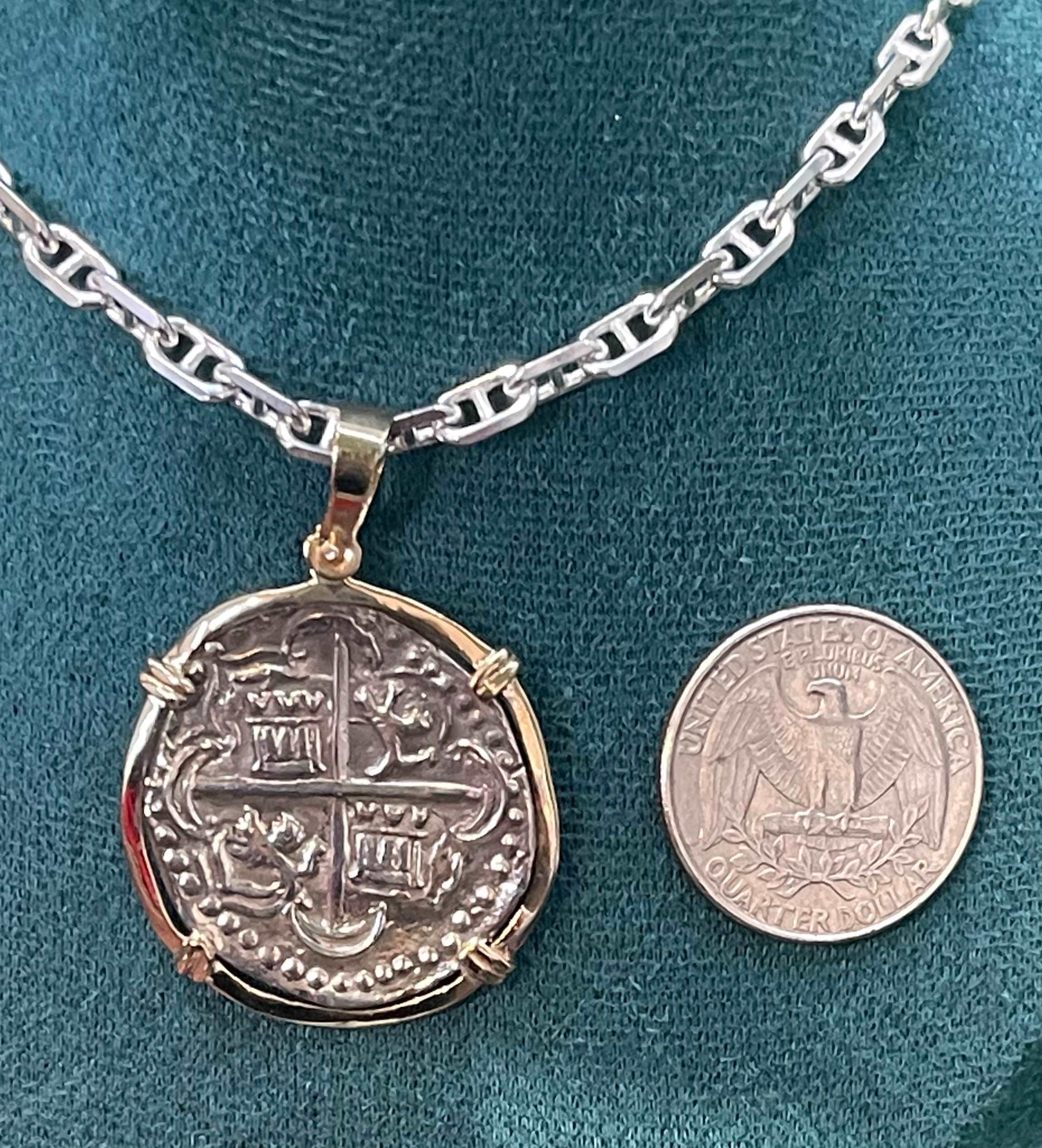 NUESTRA SENORA DE ATOCHA SOLID SILVER COIN PENDANT IN 14KT SOLID GOLD BEZEL