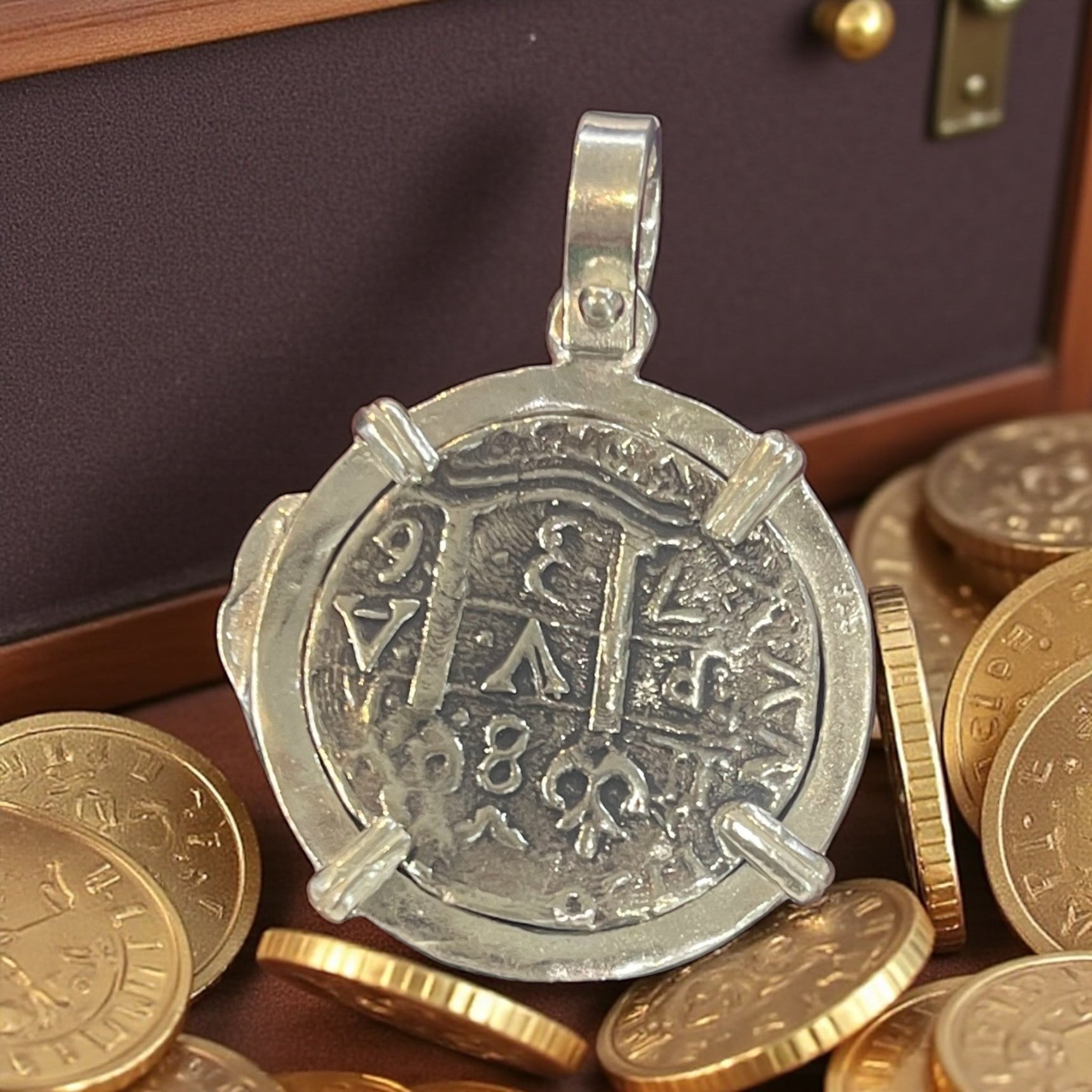 ATOCHA SOLID SILVER COIN PENDANT IN FISH BEZEL