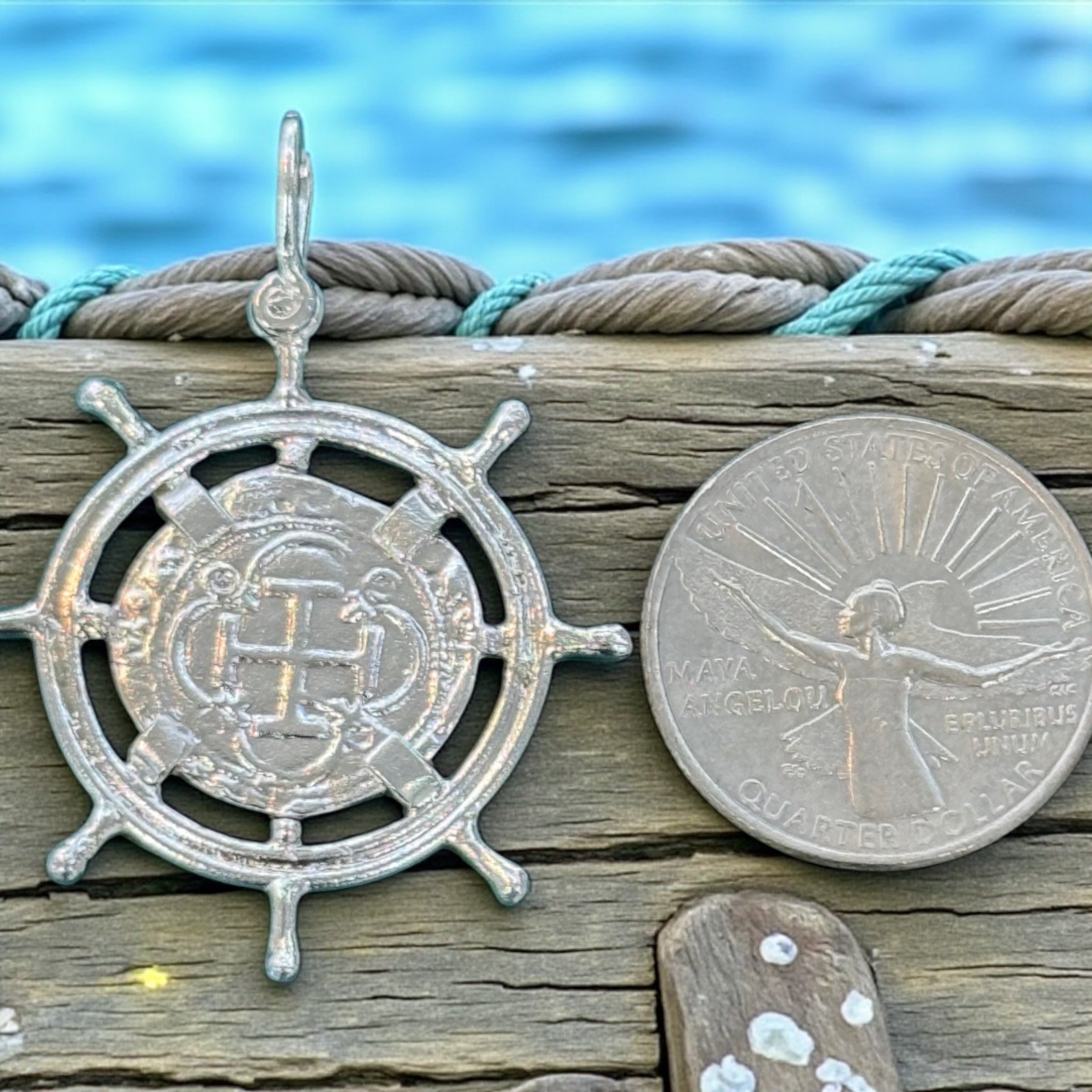 ATOCHA SILVER SHIPS-WHEEL COIN PENDANT