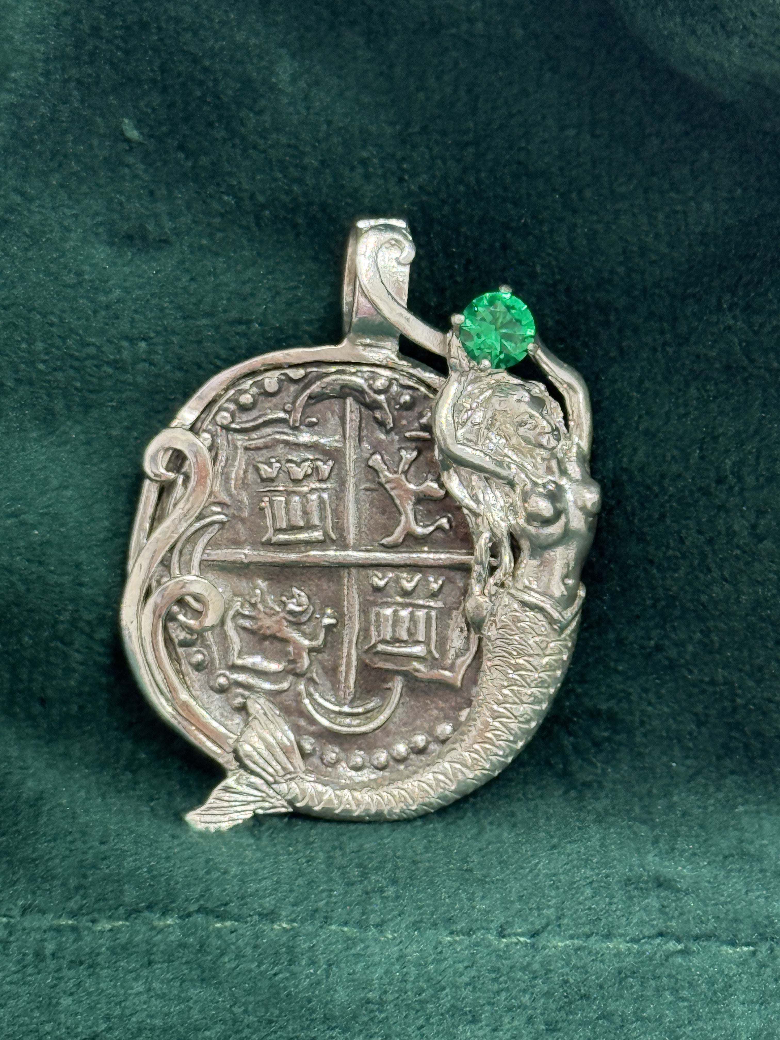 Atocha shipwreck silver coin pendant in mermaid bezel holding emerald