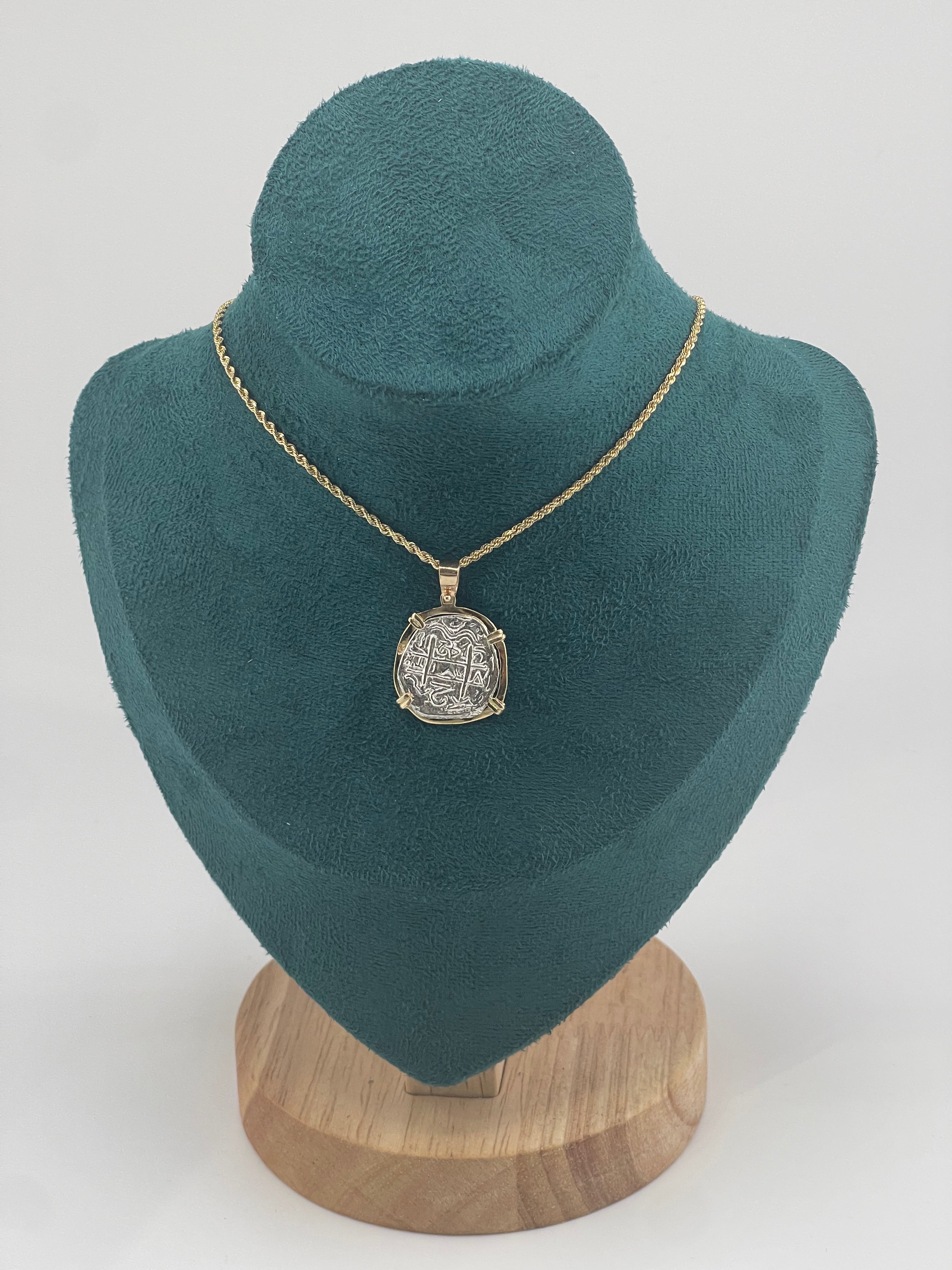 NUESTRA SENORA DE ATOCHA SILVER COIN PENDANT IN 14KT GOLD BEZEL