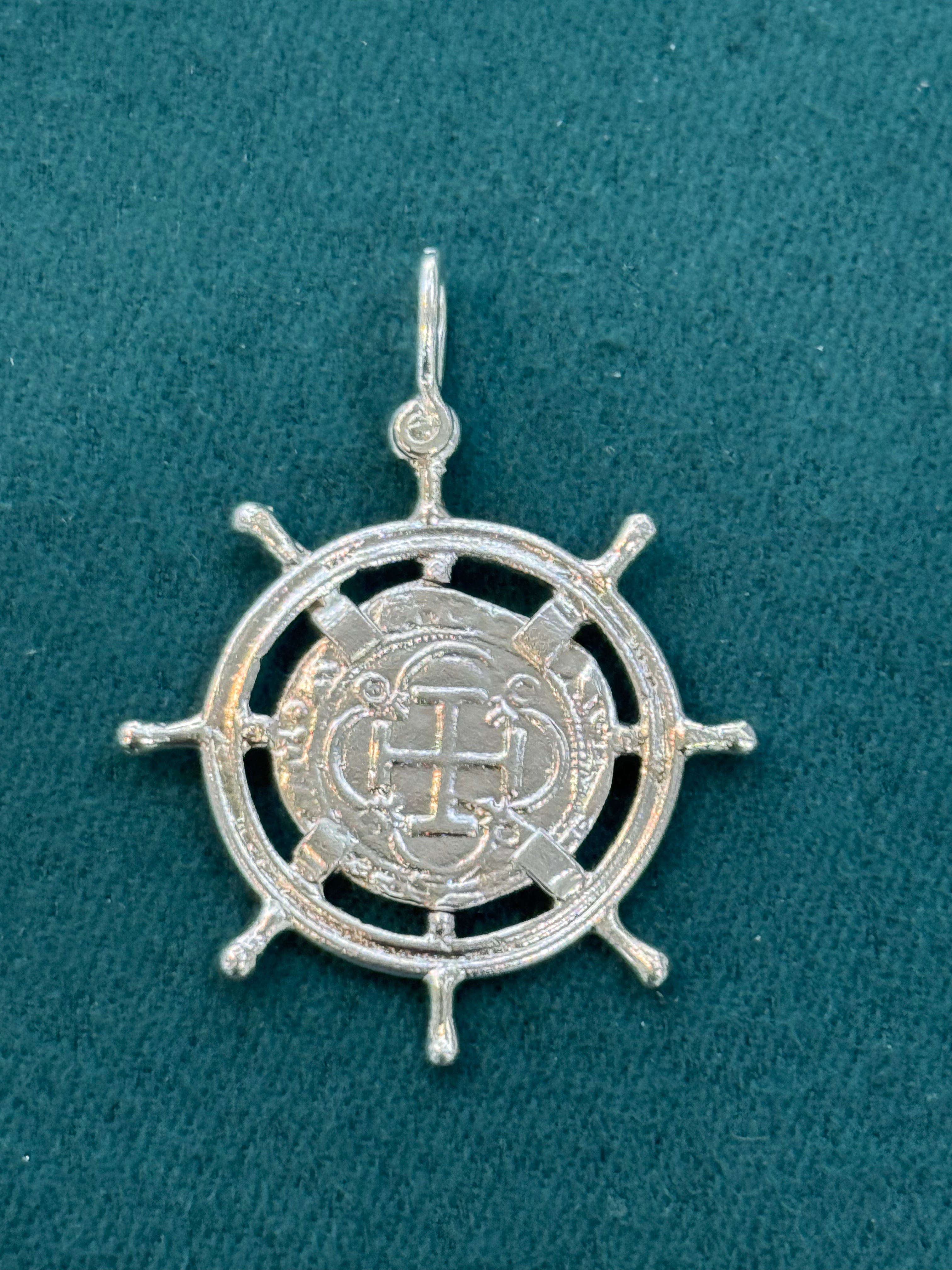 ATOCHA SILVER SHIPS-WHEEL COIN PENDANT