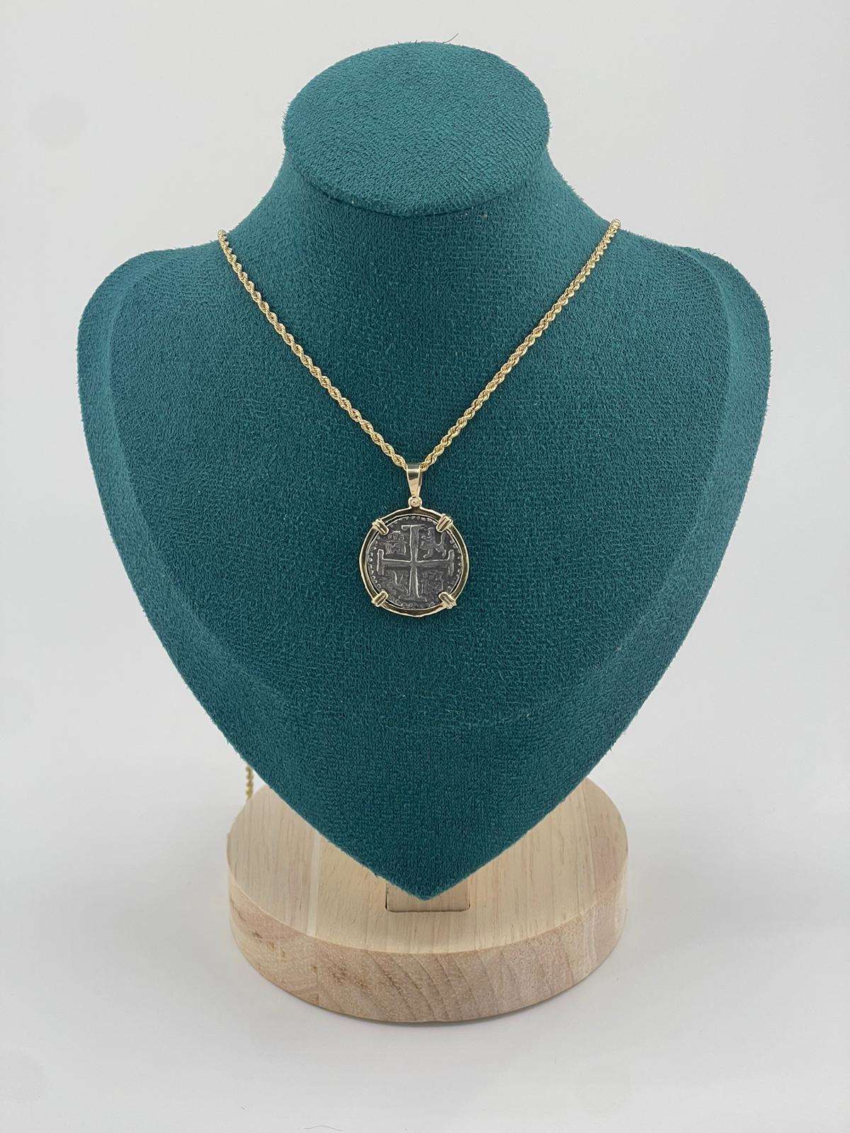 NUESTRA SENORA DE ATOCHA SILVER COIN PENDANT IN 14KT GOLD BEZEL