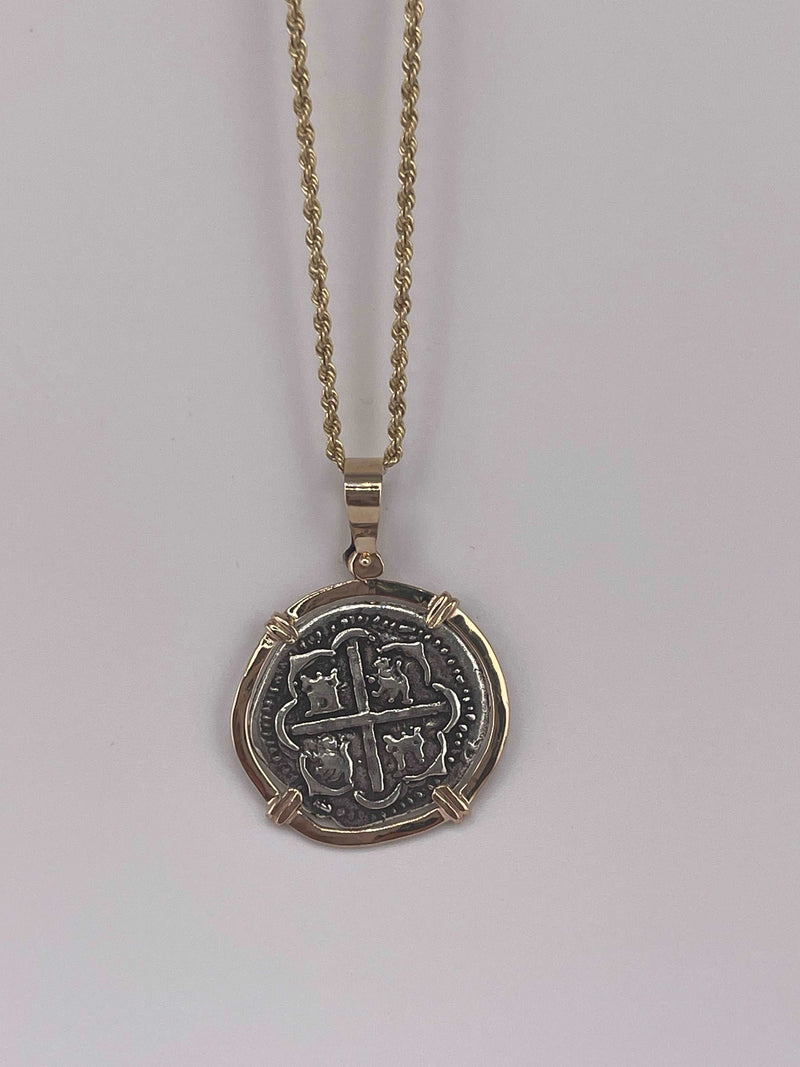 NUESTRA SENORA DE ATOCHA SILVER COIN PENDANT IN 14KT SOLID GOLD BEZEL