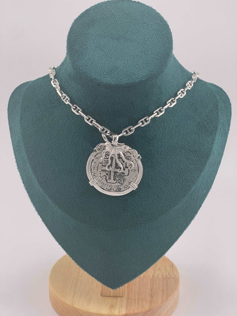 ATOCHA SOLID SILVER COIN PENDANT IN BEAUTIFUL OCTOPUS BEZEL