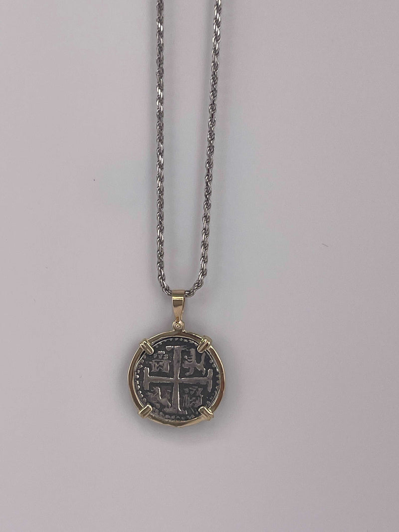 NUESTRA SENORA DE ATOCHA  SILVER COIN PENDANT IN 14KT GOLD BEZEL