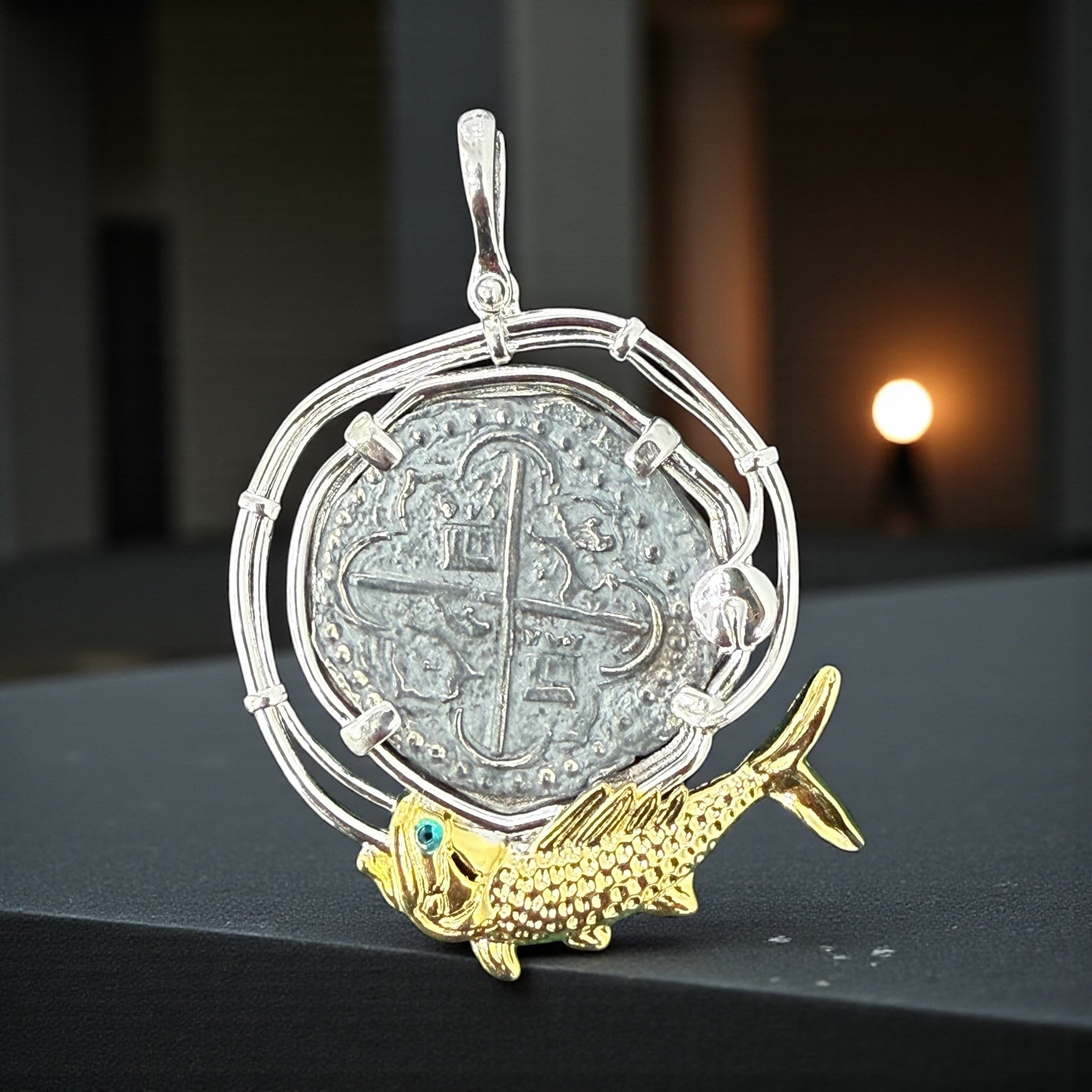 Atocha large size silver coin pendant in beautiful hook rope bezel and 14k gold vermeil fish setting on bottom in green crystal eye