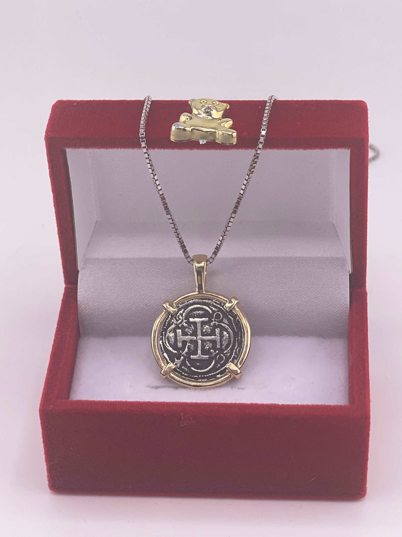 NUESTRA SENORA DE ATOCHA  SILVER COIN PENDANT IN 14KT GOLD BEZEL