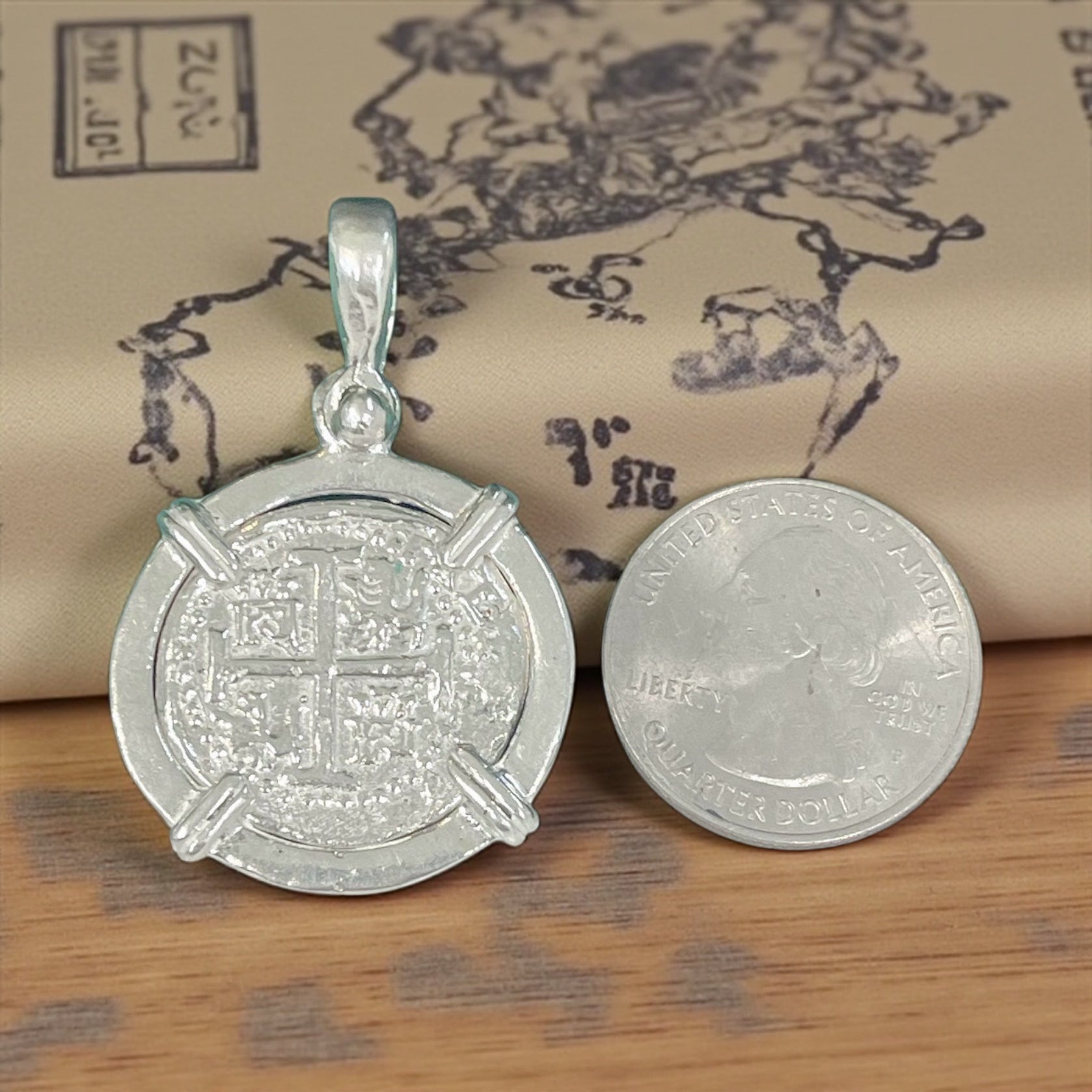 ATOCHA SOLID SILVER COIN PENDANT