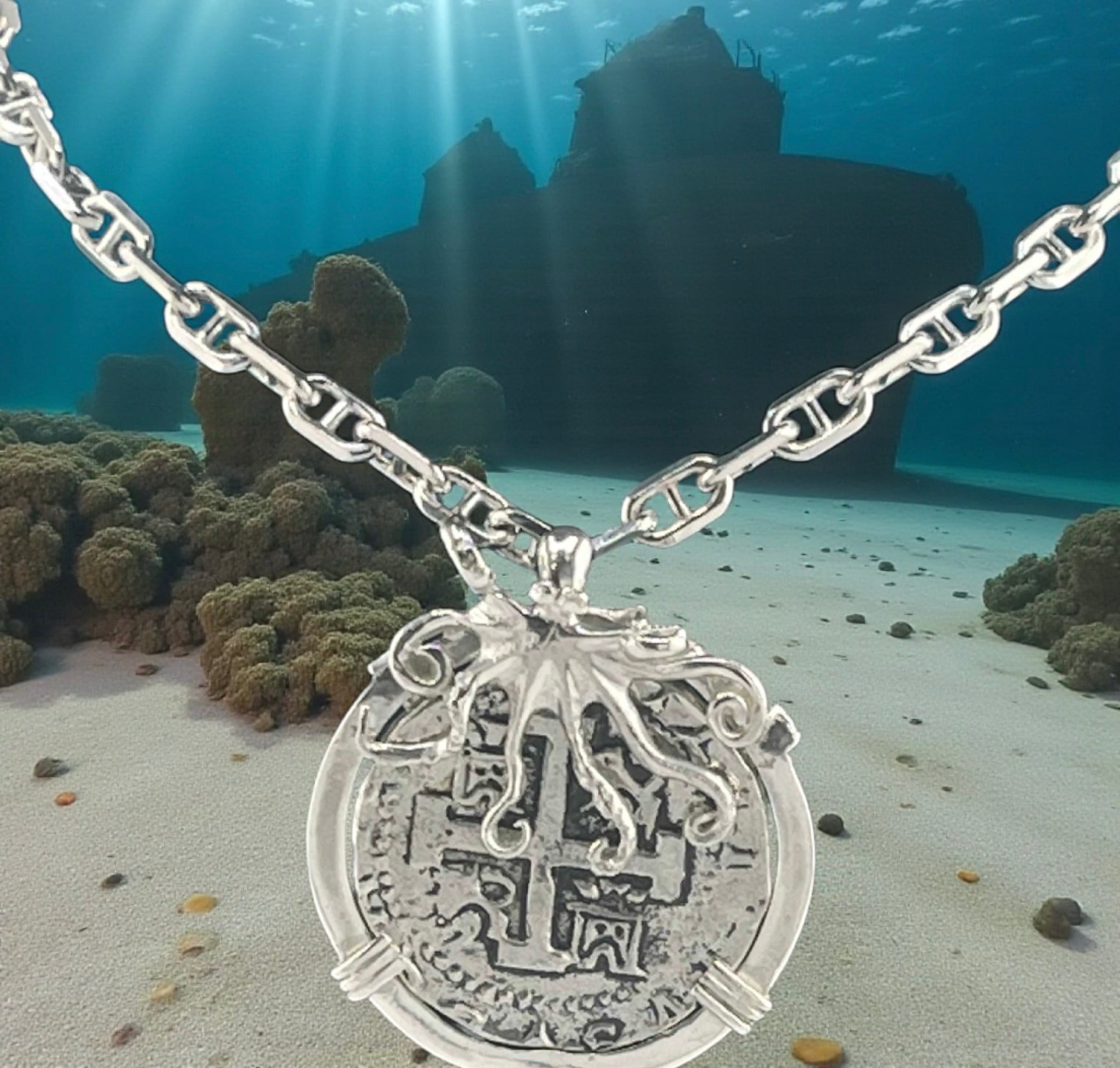 ATOCHA SOLID SILVER COIN PENDANT IN BEAUTIFUL OCTOPUS BEZEL