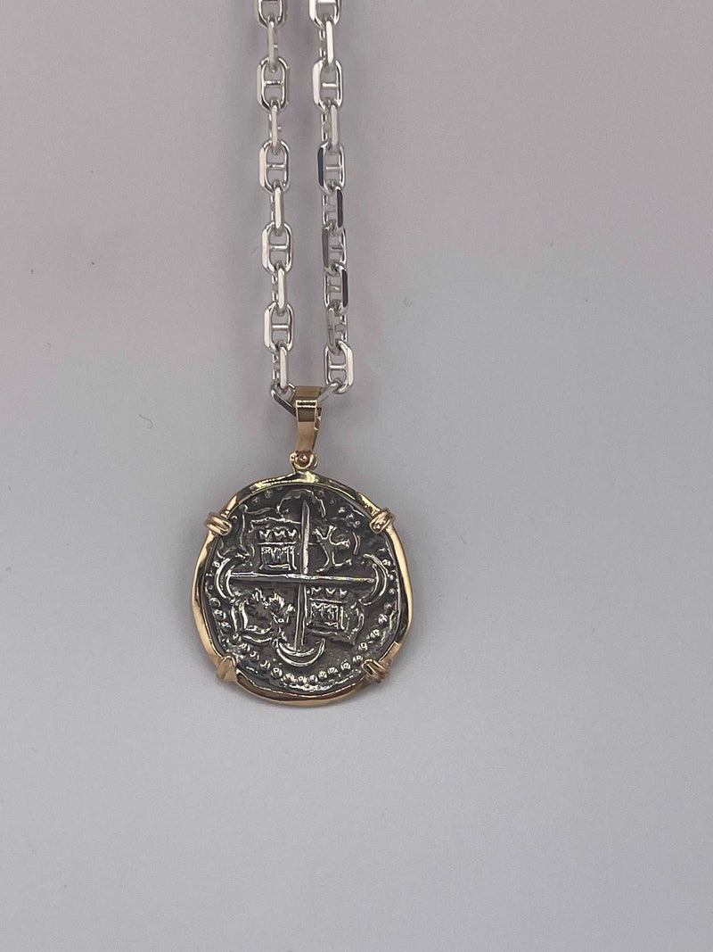 NUESTRA SENORA DE ATOCHA SOLID SILVER COIN PENDANT IN 14KT SOLID GOLD BEZEL