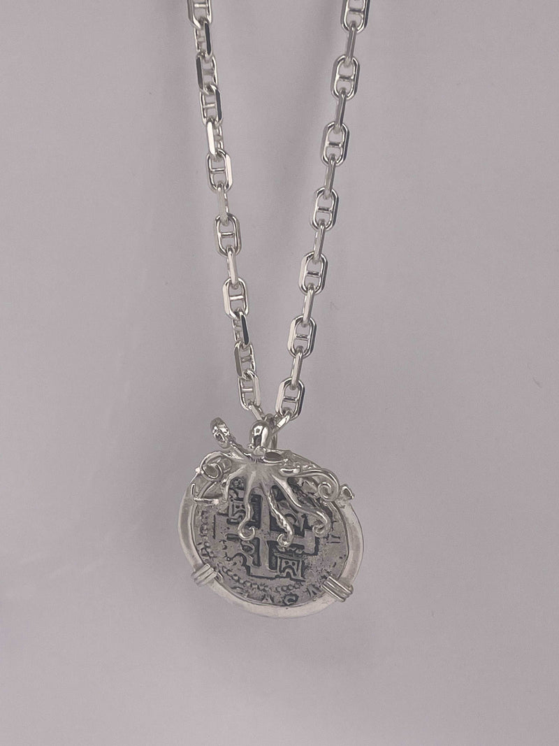 ATOCHA SOLID SILVER COIN PENDANT IN BEAUTIFUL OCTOPUS BEZEL