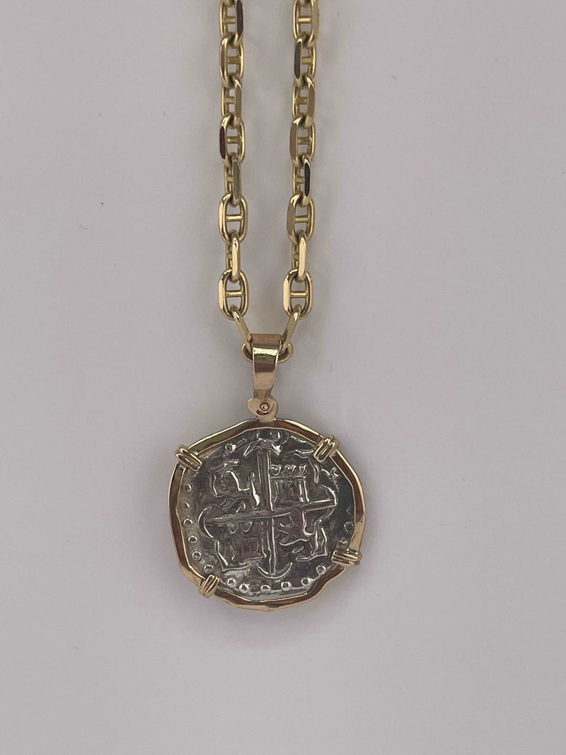 NUESTRA SENORA DE ATOCHA SOLID SILVER COIN PENDANT IN 14KT SOLID GOLD BEZEL