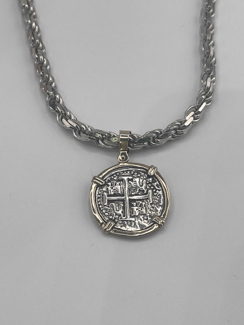 NUESTRA SENORA DE ATOCHA  SILVER COIN PENDANT IN 14KT GOLD BEZEL