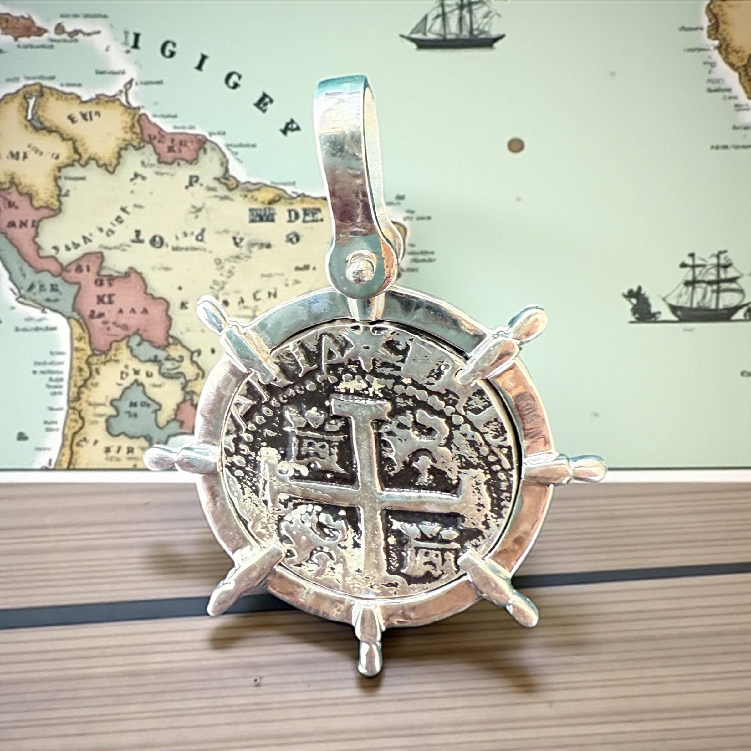 ATOCHA SOLID SILVER COIN PENDANT QUARTER SIZE IN SHIP’s WHEEL SETTING