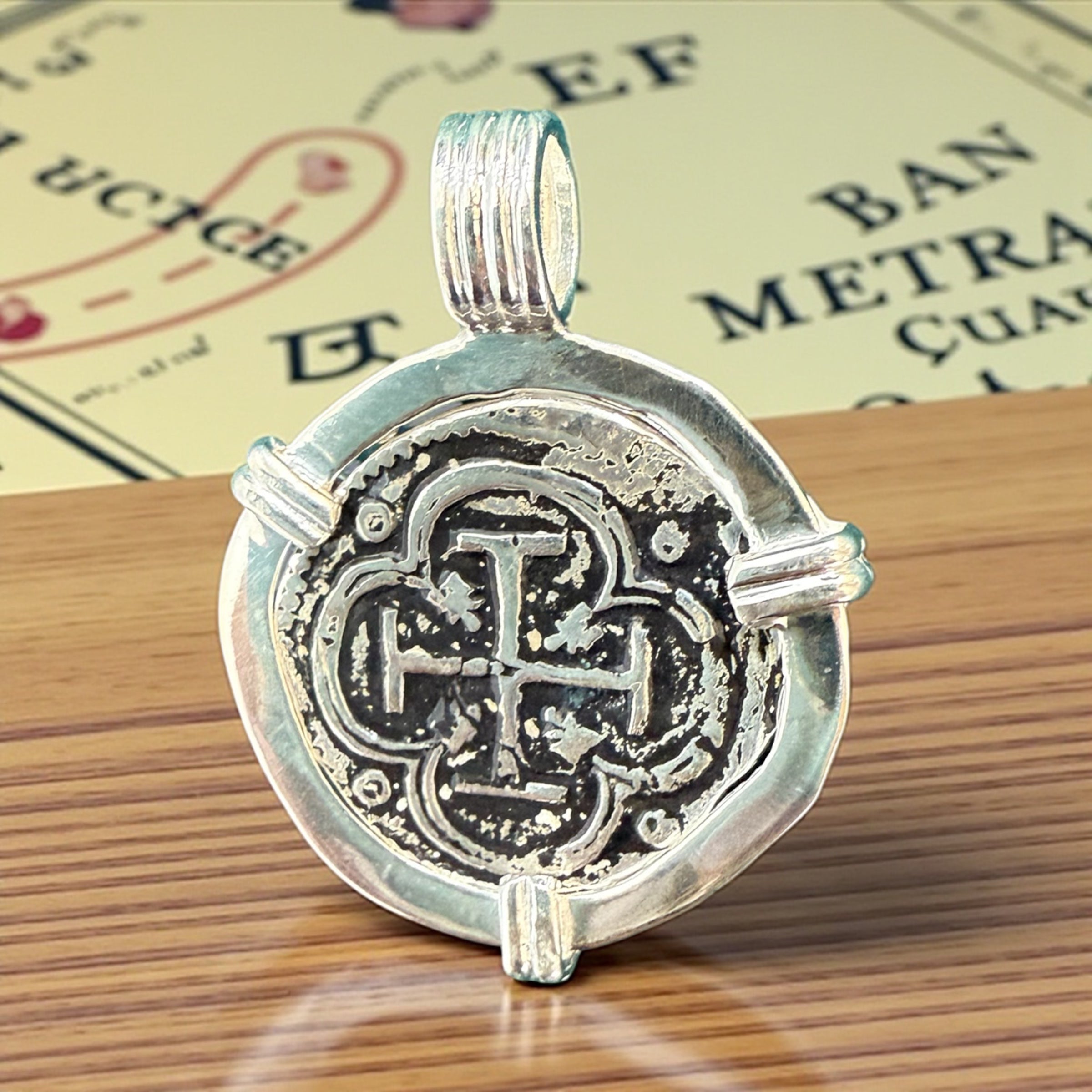 ATOCHA SOLID SILVER COIN PENDANT