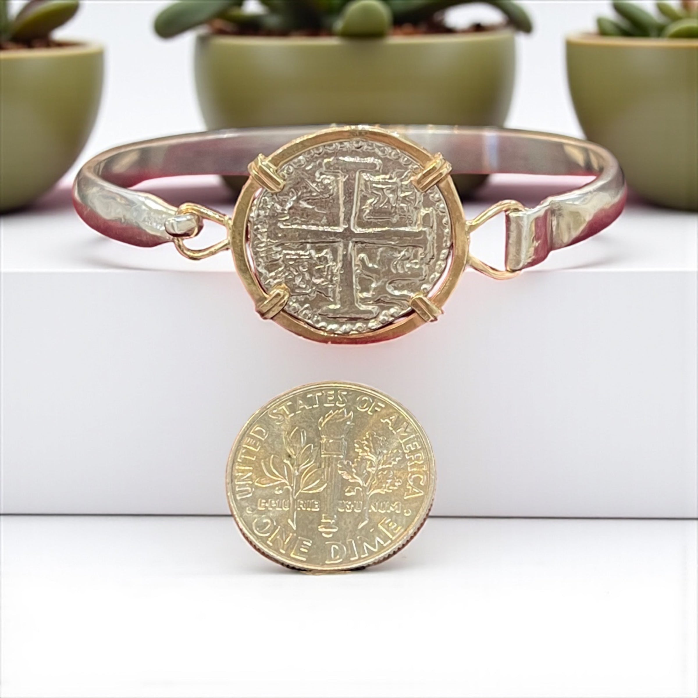 ATOCHA SOLID SILVER COIN BANGLE BEZELED WITH 14k SOLID GOLD BEZEL