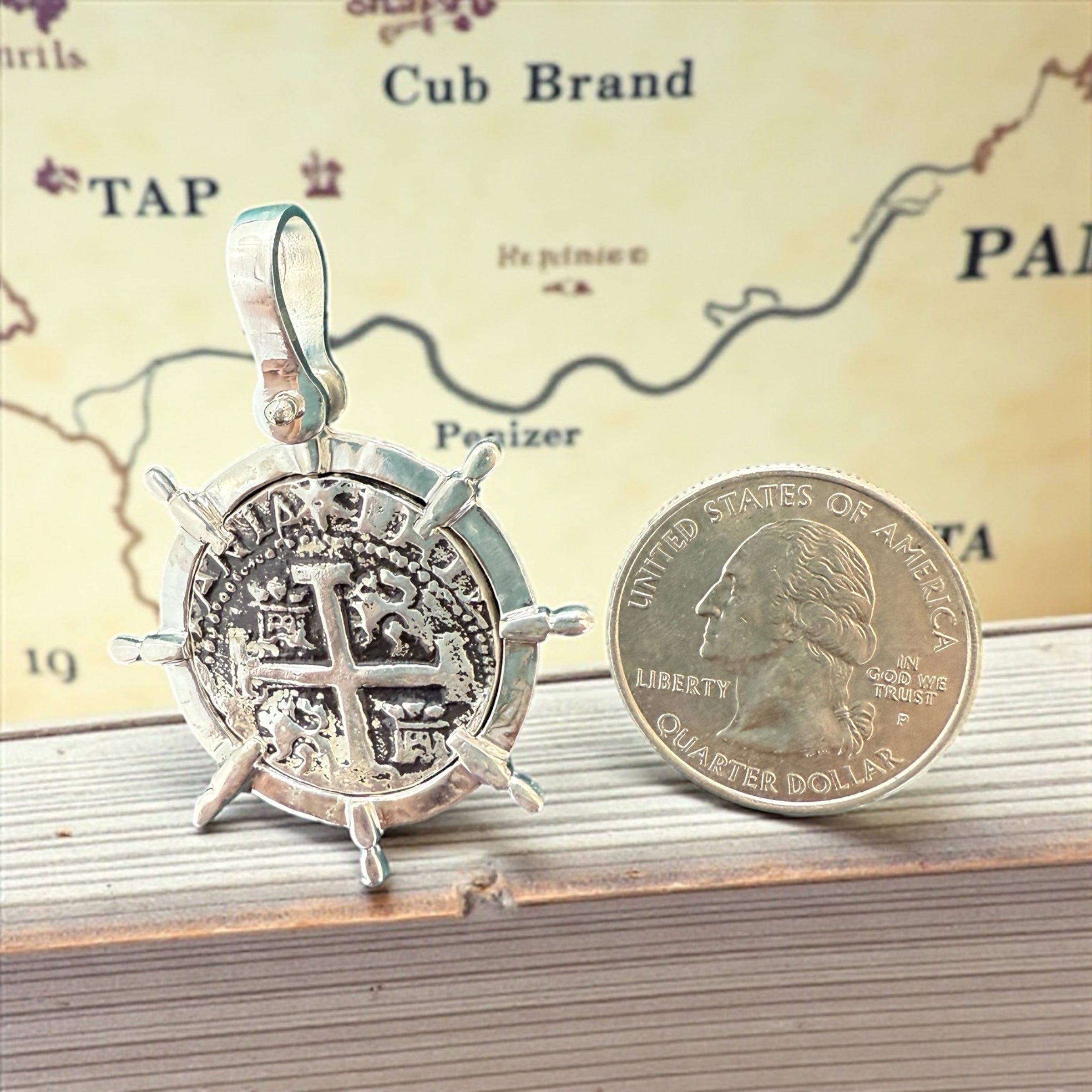 ATOCHA SOLID SILVER COIN PENDANT QUARTER SIZE IN SHIP’s WHEEL SETTING